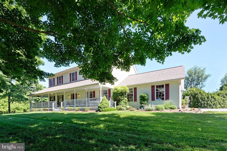 Welcome to Willow Pond - your new home in Middleburg! Located only minutes from the stop light in the center of town this charming home sits back off the road on 3 open acres with a wraparound porch that looks over the sweeping lawns, stacked stone walls and a small pond. Owned by its original owner, this home has been meticulously maintained over the years. Recent upgrades include new carpeting, LVP flooring, paint and light fixtures. This stunning Colonial offers a traditional floor plan which includes 4 bedrooms and 3 full baths. Enter through the covered front porch into the foyer with gleaming hardwood floors. On either side is the formal dining room and living room adorned with chair rail and crown moldings. Walk straight back into the spacious kitchen with quartz countertops, island and stainless steel appliances. The kitchen opens to the breakfast room with large bay window and the family room highlighted by a floor to ceiling stone (gas) fireplace and glass doors to the open rear back deck. The upper level has a large primary suite featuring a luxury bath with dual vanities, a separate shower, a soaking tub and a walk-in closet. Three guest bedrooms share a full bath and there’s a separate laundry room for added convenience. The full-sized, unfinished lower level includes plumbing for a full bath, house utilities and ample space for storage or potential additional rooms. It offers walkout back doors and interior stairs. An attached two car side loading garage offers extra space for additional refrigerators, freezers and workbenches. The house sits back on the parcel and enjoys beautiful southern views. Multiple options for entertaining on the long covered front porch or the open rear back deck. Don't miss this turnkey home that is move in ready! (Be sure to watch the video). Enjoy the tranquility and beauty of Willow Pond, your perfect new home in Middleburg.