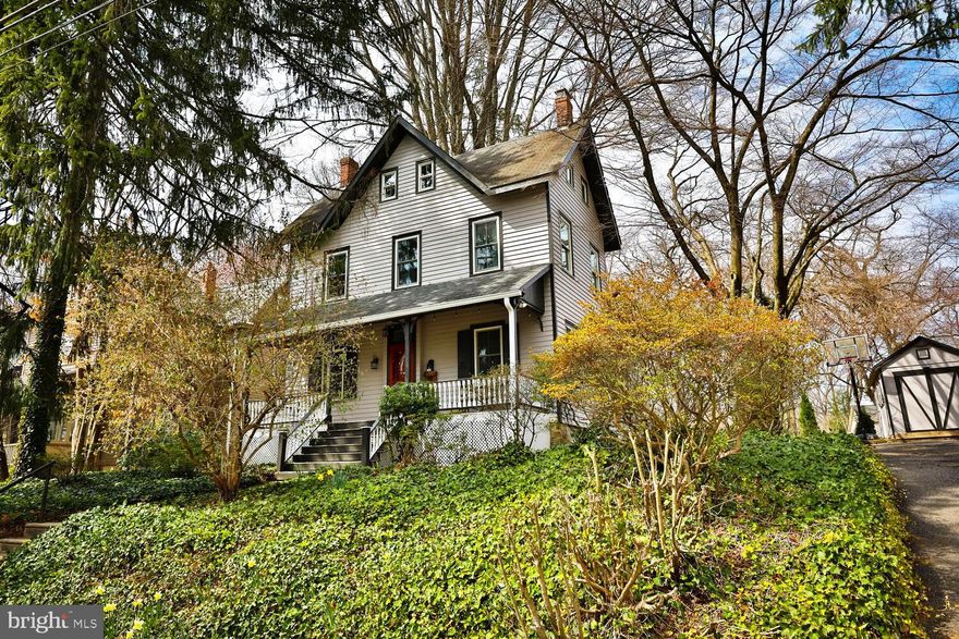 Welcome to Woodland Road, one of the prettiest streets in the historic neighborhood of Wyncote where unique and charming homes abound.  This three storied treasure sits high with a welcoming front porch and  transom front door.  The circular flow of the first floor will lead you from the entrance hall into the living room, which is presently being used as a music studio and then into the heart of the home, the kitchen.  This space beautifully combines old world charm with modern amenities.  White quartz countertops and slate tiled backsplashes  compliment the cabinetry and upgraded appliances; 5 burner gas range, under the counter beverage cooler, deep stainless steel sink with goose neck faucet, and an antique corner cabinet.  Adjacent to the kitchen is a large laundry/ powder room combination that includes a coat closet.  The comfortable family room with large game closet and sliders that exit to the lovely back yard, provides a cozy and inviting space.  The generous dining room with ample natural light from the large windows are graced with built in cabinetry.  Up the staircase you'll find a large flex space perfect for an office or second family room, along with a bedroom and hall bath featuring a claw foot tub.  The third floor offers two additional rooms and a large full bath with stall shower, sky light and two  double closets. 
 Additional updates include first floor hardwoods, new windows throughout and upgraded electric service (no Knob & Tube!).    Located a short walk to the Jenkintown Train station and the popular Thomas William Park, local shops and a convenient drive to Center City, this home offers charm and convenience.