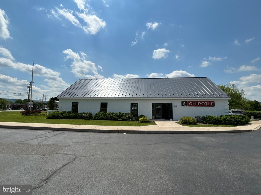 15 Maplewood Drive is a opportunity to purchase a Net Leased Investment property with a long term lease by Chipotle.  Chipotle is currently completing their construction and is scheduling to open in June. 

Investment Highlights- 
New 15-Year Lease with 10% Increases Every 5 Years

Enhanced Value in Oversized 2.33-Acre Parcel with “Chipotlane” Drive-Thru

Strong Corporate, Investment Grade Retailer (NYSE: CMG)

Signaled Corner, High Traffic Location to 37,638 VPD

High Placer.ai Counts from Neighboring Uses

Industry Leader with 3,000+ Locations and $7.5B in Revenue

New 15-Year Corporate Lease - The Tenant, Chipotle Mexican Grill, Inc., is subject to a new 15-year lease to commence in Summer 2024. The corporate lease features 10 percent rental increases every five years during the base term and option periods, providing an excellent hedge against inflation. Chipotle will operate in a 5,468-square-foot store, with 3,100 square-feet on the ground floor. There is a 2,200-square-foot lower level but it will not be used by the tenant. The site will also feature a "Chipotlane" modernized drive-thru. A longtime leader and innovator in the food industry, Chipotle is publicly traded on the New York Stock Exchange under the ticker NYSE: CMG.

Oversized 2.33-Acre Parcel – The Tenant occupies a 2.33-acre parcel which is significantly larger than typical for Chipotle. On average, Chipotle locations occupy between 0.50-1.0-acres. This enhances the security of the investment by offering long-term flexibility. The developer completed various layout configurations for this parcel including two pad buildings as well as a strip center, but elected for the faster and less capital intensive option of retrofitting this former bank branch. The buyer will inherit this long-term upside to maximize the lot’s area should the tenant vacate.   

Prominent, High Traffic Location - Chipotle is prominently located along Maplewood Drive with fully signalized access between the east and westbound lanes of Route 422. Route 422 is the area’s primary route, averaging 37,638 vehicles per day. The property is at the center of the Douglassville retail node.

*Owners are PA Licensed Real Estate Agents

Please Contact Listing Agent for more information,