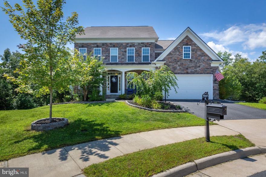 HERE IS YOUR DREAM HOME! Shows like a model w/tons of upgrades + 4650 fin.sq. feet of gorgeous! 9FT CEILINGS ALL 3 LEVELS. Gourmet light filled kitchen w/ morning rm. X-LGE. master w/sitting area,tray ceiling,tiled MB.PREMIUM FLAT lot on cul de sac,backs to trees,fenced,peaceful rear deck.5th.x-lge. bed in base.Hardwood main floor.See this beauty + experience GREAT value for yourself! Close to 95!