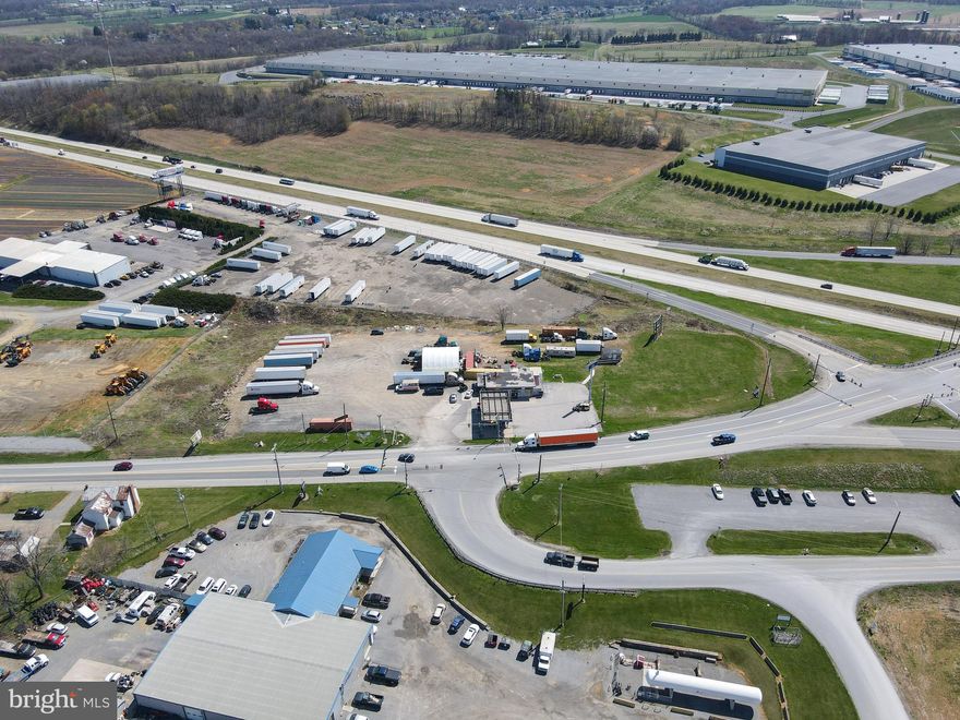 Prime Industrial/Commercial land along Interstate 81 in Pennsylvania. 3.99 Total Acres off of Interstate 81, Southbound exit 24. Includes two parcels (tax ID 21-0N14.-084.-000000 and 21-0N14.-081B-000000) Currently in use as a gas station with 8 pumps, convenience store, truck parking/stop. Two entrances/exits, one with a stop light. Multiple Warehouses currently built off the exit, multiple more proposed and under construction. More additional acreage  possible.