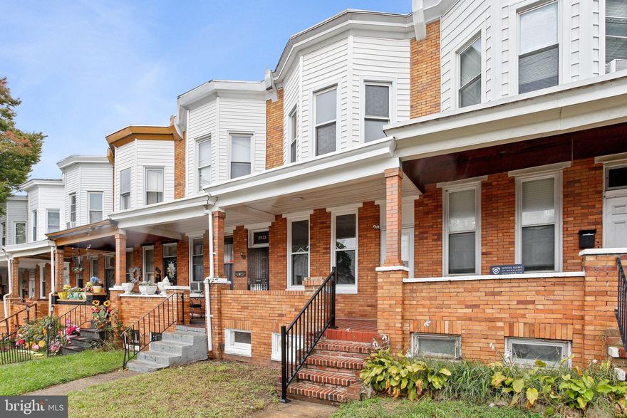 Newly Renovated 3 Bed 2 Full Bath Baltimore Brick Row House with a Welcoming Front Porch, Over 2,000 Total Square Feet, Stainless Steel Appliances, Fresh Paint, and New Carpet. The Brick Front Porch with Quarry Tile Leads to an Entrance Way with Storm Door and Six Panel Front Door with Transom Window Above into a Combined 28' x 14' Living Room and Dining Room Open Concept Perfect for Entertaining. The Main Level Features a Living Room with Ceiling Fan and an Archway Leading to the Adjoining Dining Area with Ceiling Fan, Large U- Shaped Kitchen with Island, Abundant Countertop Space and Storage, Stainless Steel Appliances, Pendant and Recessed Lighting, Tile Backsplash, Gas Range, Under Cabinet Mount Microwave, French Door Refrigerator, Window above the Stainless Steel Sink Providing Natural Light and a Gentle Breeze, and Rear Door Leading to 12' x 8' Wood Deck. The Upper Level Encompasses a Primary Bedroom with Grandiose Bay Window, Recessed Lighting, Carpet, Ceiling Fan, and Double Door Closet, Bedroom Two with Rear Facing Double Hung Window, Carpet, and Recessed Lighting, Bedroom 3 with Ceiling Fan and Carpet, and Full Bathroom with Walk-In Shower with Ceramic Tile Surround and Ceramic Floor. The Lower Level Basement Includes a 40' x 13' Rec Room / Fourth Bedroom with Carpet, Recessed Lighting, and Washer and Dryer Hookups, Utility Room with Space for Storage, Sump Pump, and Concrete Floor, Full Bath with Walk-In Shower and Recessed Lighting, and Rear Walkout Exits into Private Back Yard with Wood Surround Fence. Convenient to World Renowned Johns Hopkins University and John Hopkins Hospital, Travel (Route 1, Route 40, and I-895), Universities (Morgan State University and University of Baltimore), Shopping, Restaurants, Services, Sports and Entertainment (Baltimore Orioles and Ravens), and Downtown Baltimore.