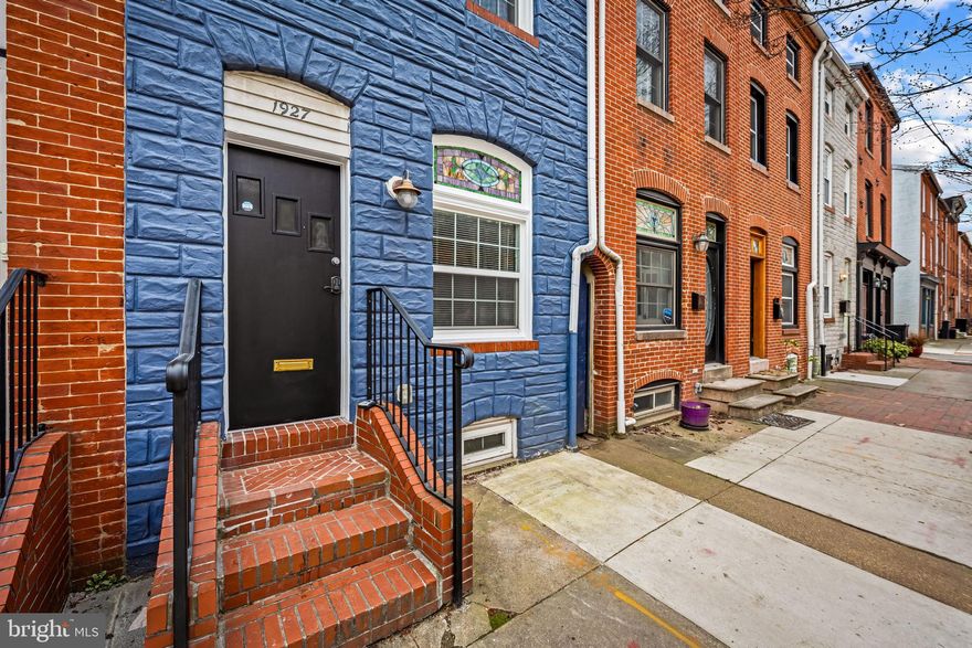 Looking for an affordable, move-in-ready home in sought-after Upper Fells Point? This fully renovated rowhome with angled parking out front is the perfect blend of location and modern convenience. Don’t let its size fool you - this thoughtfully updated gem boasts beautifully remodeled kitchen and baths, replacement windows, and major systems already taken care of, including HVAC and hot water heater (both 2018).

Step inside to discover the crisp and clean open living/dining space - accented by exposed brick and a stunning stained-glass transom over a large front window that fills the space with natural light. The stylish galley kitchen features stainless steel appliances, granite countertops, and access to a side alley - plus there’s the added convenience of a main-level powder room.

Upstairs, the second level offers two bedrooms, a spacious full bath, and a stackable washer and dryer for easy laundry access. The entire third floor is dedicated to a private primary suite, with a large walk-through closet and a generous, fully renovated bathroom.

Location can’t be beat! Just one block from the acclaimed Little Donna’s and within easy walking distance to other neighborhood favorites, local pubs, Patterson Park, and the Fells Point waterfront, you’ll enjoy the best of city living right at your doorstep. This is your opportunity to own a stylish, fully-renovated home in one of Baltimore’s most vibrant neighborhoods.