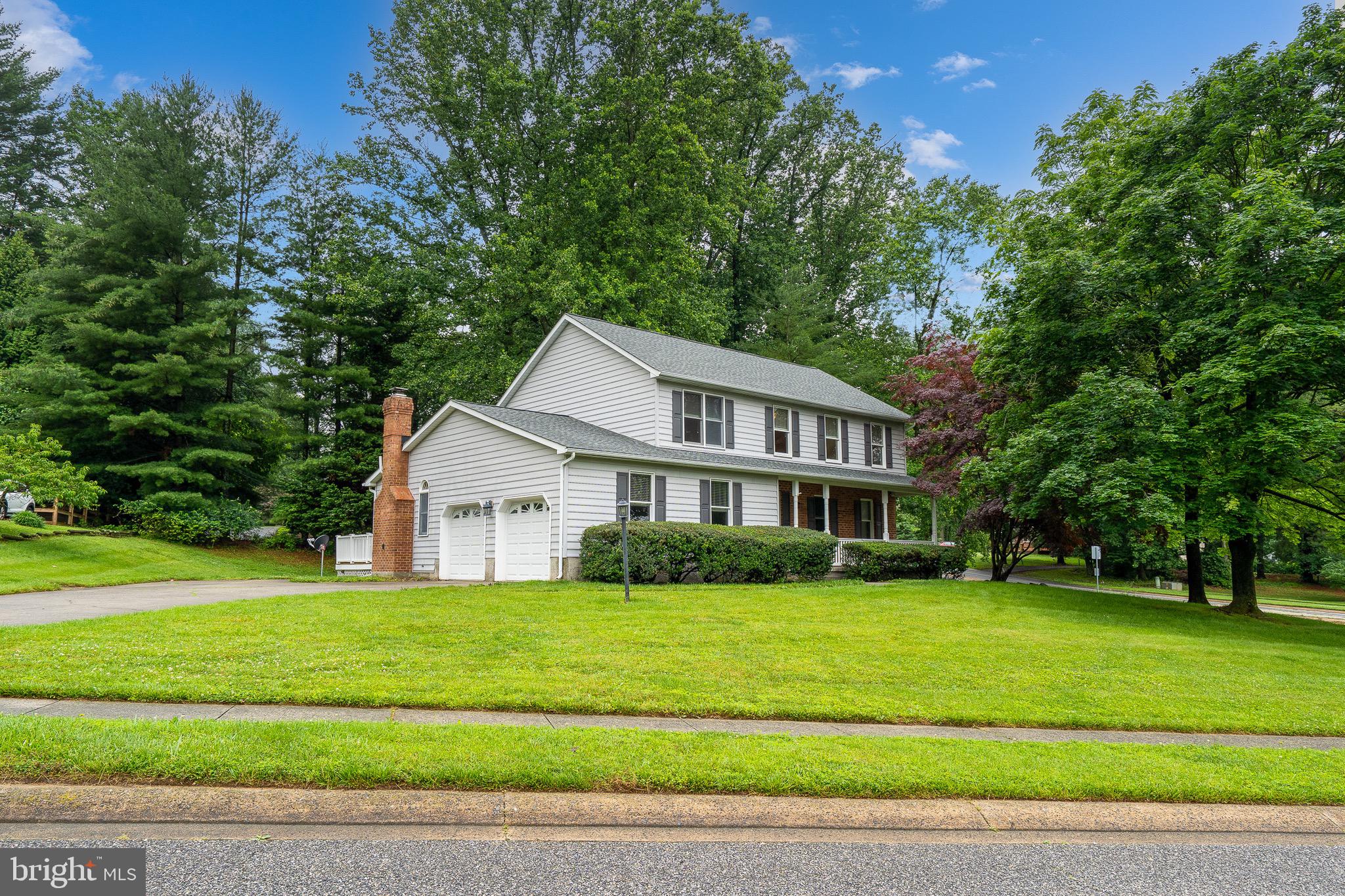 Welcome to this beautifully maintained Colonial-style home, perfectly situated on a spacious corner lot—with no HOA! Offering 4 bedrooms, 3.5 bathrooms, and a 2-car garage, this home has it all—including a fully finished lower level with a full bath, recreation room, and bonus space ideal for a 5th bedroom, home office, or guest suite.
The main level features gleaming hardwood floors, crown molding, recessed lighting, and a modern kitchen with granite countertops, stainless steel appliances, and updated cabinetry. Upstairs, you'll find generously sized bedrooms, including the primary suite with vaulted ceilings, a renovated en suite bath, and a custom walk-in closet.
Enjoy additional living space in the lower level complete with a kitchenette, full bath, and versatile living areas—perfect for entertaining or extended stays. Step outside to a maintenance-free deck, ideal for relaxing or hosting.
Most recent notable updates include a brand-new roof (June 2025), new shutters (2024), Hot water heater (2019). Additional updates within the last 10 years include: new wood flooring in family room, custom blinds, new front porch, new attic stairs, new furnace and AC unit, kitchen appliances, granite countertops, renovated primary bathroom, finished the lower level to include kitchenette area and full bathroom, and new garage doors. Radon mitigation system already installed.
With no HOA and a brand-new roof just installed, this home truly has it all—space, style, and convenience. Don’t miss your chance to make this one yours!