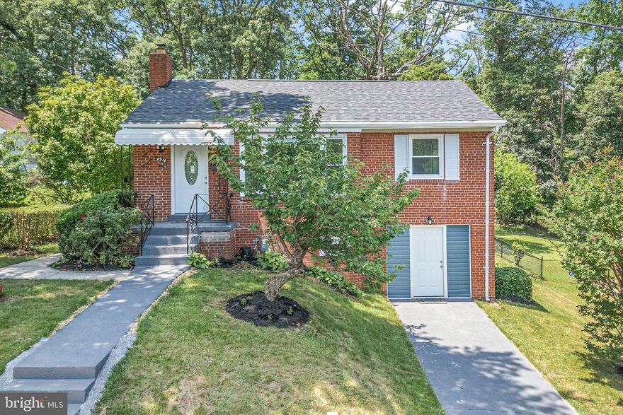 Beautiful 5-bedroom, 2 full baths brick home. The entire house has been fully renovated, and the kitchen has been remodeled and updated with modern cabinets and top-of-the-line appliances, including a natural gas range.  Fully finished basement with approved permits for 2 bedrooms, 1 bath, ample basement bar area with sink and stove. New flooring, fresh paint, new windows throughout, new front door, new roof, new ductwork with a new HVAC unit and compressor, updated electricity with an upgrade to a new electrical meter and panel. Washer and dryer convey.  New quaint patio to enjoy those afternoons and evenings with family dinners or just listening to the birds. The large lot backs against the county forest, providing privacy and a nice environment.  
Close to Walmart, several shopping centers, restaurants, a bowling alley around the corner, and entertainment. Close and very accessible to I-295 and Annapolis Road.