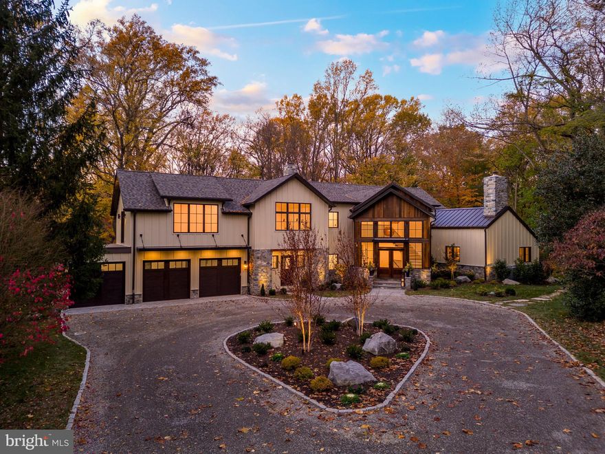 Just launched, this custom-designed Chestnut Hill sanctuary, perfectly nestled amongst lush trees and plantings on a secluded street, yet within walking distance of the vibrant shopping and dining along Germantown Avenue. This renovated, expanded and completely reimagined home overlooking Fairmount Park was designed to seamlessly melt into the gorgeous setting bringing the outdoors in, with custom oversized Marvin windows strategically placed to take advantage of the beautiful views. Outdoor living spaces like the screened-in cedar porch with poplar flooring and stone fireplace, the expanded rear deck and the oversized primary suite deck all serve as outdoor extensions of the interior living space. Numerous reclaimed elements take center stage in this residence, along with poplar beams and the original schist fireplace. As you enter the mahogany front doors, you're greeted by a grand two-story entryway with elegant white oak herringbone floor. To your left, the stylish and functional mudroom features radiant heat flooring, a custom mahogany Dutch door, dual built-ins with reclaimed wood, a large coat closet, and access to the oversized 3-car garage. The study features built-ins with a reclaimed wood top and beams and will suit all your needs, with wiring for sound and TV, and offers picturesque views of the rear yard and park beyond. The open and airy kitchen and family room are the heart of the home. The kitchen was personally designed for culinary enthusiasts and boasts an oversized Brazilian quartzite island, Caesarstone countertop and backsplash. The alder and charcoal cabinetry offer both style and functionality. Top-of-the-line Dacor appliances include two dishwashers, Columnar fridge and freezer, range with steam oven, built-in wall oven, and microwave. Additional features like under cabinet lighting, pot filler, and a stylish wet bar with beverage center, ice maker and dishwasher enhance this kitchen's appeal. Adjoining the kitchen is the family room retreat featuring a linear gas fireplace, custom built-ins and a/v. Perfect for entertaining, the dining room features buffet storage cabinets with Caesarstone top and a custom slide and fold glass door connecting the interior to the cedar screened-in porch. A true haven for relaxation with a wood burning stone fireplace with reclaimed mantel, and a/v. The first floor is complete with a cozy living room with original stone fireplace and paneled vaulted ceiling with rustic beams, and a stylish powder room featuring a custom wall-to-wall granite sink. Walk up the custom-built white oak stairs with forged steel balusters on your way to the oversized primary suite. Indulge in luxury at the beverage center with a sink and fridge before you step into the large, light-filled bedroom with an abundance of windows. The lavish primary bathroom features marble flooring with radiant heat and double vanity with quartz counters. Relax in the walk-in shower or unwind in the oversized soaking tub overlooking the serene setting. The additional 3 bedrooms, 2 ensuite, offer comfort and style with Karastan Carpets and custom closet built-ins. The second floor is complete with a full hall bath and well-appointed laundry room. The lower level is designed for recreation and features a gym. The ensuite bedroom on this level is a haven within the home, with a full bath and Karastan carpeting. Modern amenities abound, such as Lutron, Sonos, 2 art TV’s plus outdoor TV, radiant heat and upgraded lighting. Living in the historic and impeccable location of Chestnut Hill offers exclusive shopping, culinary delights, Wissahickon Park, public transportation and so much more. This home has a graduated 10 Year Philadelphia Tax Abatement.