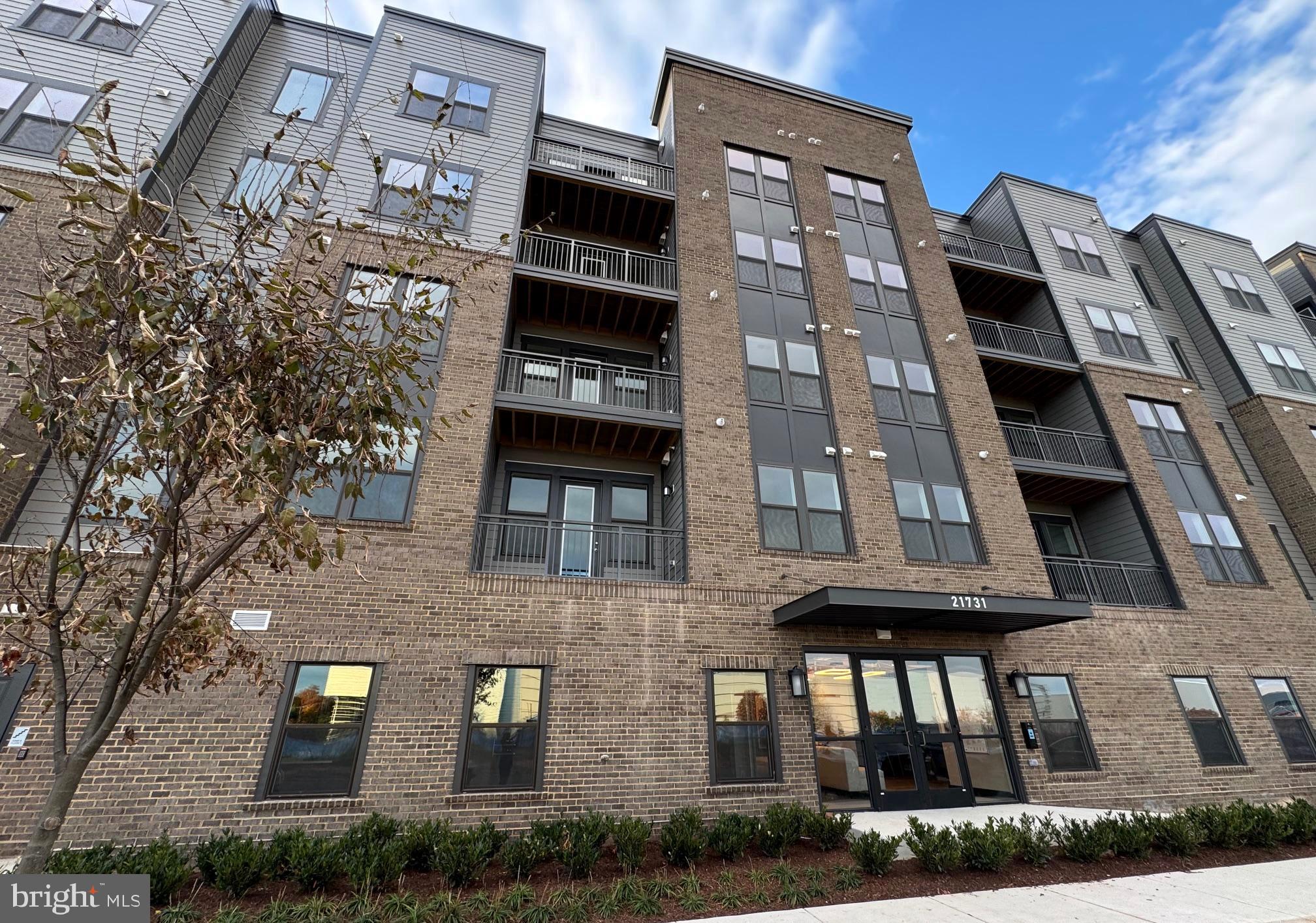 Welcome to 21731 Dovekie Terrace #304, where modern luxury meets effortless living. This brand-new elevator condo offers true single-level living with 2 spacious bedrooms, 2 full baths, and a private home office — perfect for hybrid work or creative space. With over 1,300 sq ft of sleek design, enjoy 9-foot ceilings, luxury vinyl plank floors, a private balcony for morning coffee, and a meticulous, open-concept kitchen with stainless steel appliances and quartz countertops.
Located in Waxpool Crossing, this light-filled unit brings together comfort, community, and convenience. Step outside to enjoy amenities like a community grill and outdoor pavilion , and lots of areas to enjoy your morning run. Garage parking, elevator access, and fellow young professionals make everyday living effortless.
You’re just minutes from the Silver Line Metro, One Loudoun, and some of the best shopping, dining, and nightlife in Northern Virginia. Whether you’re working downtown or playing locally, this home offers the perfect balance of vibrant lifestyle and modern sophistication — all under a full builder warranty for peace of mind.
Now available and ready for move-in — come experience Ashburn living at its best. SCHEDULE YOUR TOUR TODAY!