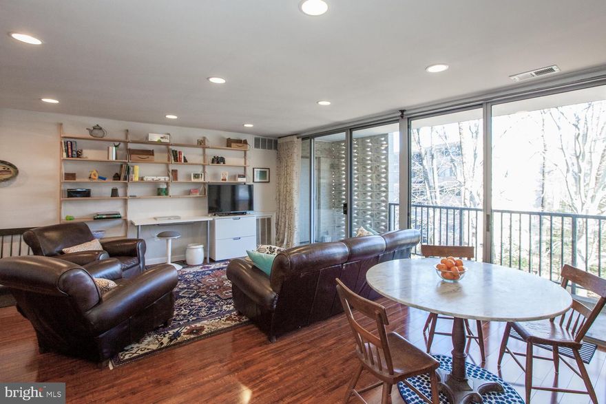 Retreat from the city to this beautifully updated 2 bedroom, 1.5 bath condo with private balcony at Briarwood Court in Annandale! Featuring gorgeous laminate wood floors, recessed lighting and loads of light throughout the open-concept living and dining room and well-appointed kitchen with granite counters and stainless steel appliances. A primary bedroom offers walk-in closet and en suite half bath while a second bedroom showcases a stylish shiplap accent wall and renovated hall bath. All this with a conveniently located laundry room just down the hall, storage locker, a lovely community pool and lots of parking! Just moments to I-495 and steps to Ossian Hall Park and Heritage Center shops and dining! *Photos were taken when occupied by owner*