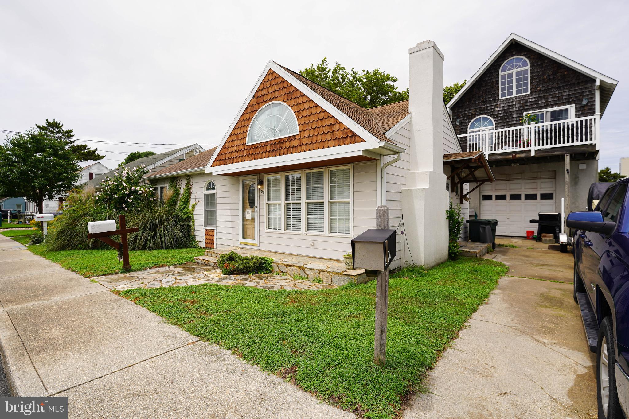 Rare opportunity in Ocean City! This property features not only a spacious main house, but also a separately metered studio apartment above the detached garage, currently rented for $1,100/month with a tenant who is open to staying—ideal for supplemental income, a vacation rental, or private guest quarters. The main home offers a solid foundation with tons of potential for cosmetic updates, giving you the chance to customize or renovate to your taste. Whether you're looking to invest, house hack, or create your dream beach retreat, the possibilities here are wide open. Situated just a short walk or bike ride to Ocean City’s famous beaches, boardwalk, dining, and entertainment, this location is hard to beat. There’s off-street parking, outdoor space for entertaining, and a hot tub that conveys for the new owners to enjoy. Plus, no HOA. Don’t miss this rare find with built-in rental income in one of the East Coast’s most beloved beach towns!