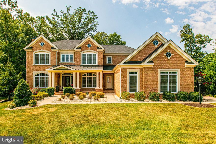 This beautiful home combines the elegance of traditional living with a contemporary edge. The Gorgeous front porch colonial has been impeccably maintained by original owners with 5 bedrooms, 4 full baths and two half baths with elegant craftmanship throughout. The home has a classic brick and siding exterior, 3-car side-loading garage, sprawling deck, contemporary lighting, high ceilings, fireplace, decorative moldings, on trend neutral paint, and an abundance of windows create instant appeal.
Step into luxury and find hardwood floors in the grand two-story foyer welcome you home and usher you into the living room featuring a bay window area. The formal dining room offers space for all occasions and is complemented by a distinctive turned staircase. Step into the spacious Family Room with gas fireplace and a generous sized powder room.
A secondary front entry leads directly to the everyday entry, kitchen, and laundry area. The very large contemporary gourmet kitchen is a show stopper!  It is beautifully well-appointed offering high-end appliances, with an island countertop, a walk-in pantry, ample counter space, and a sunlit casual dining area. Completing the main level is a private office with double door entry and a powder room.
Upstairs find the first bedroom with en-suite bathroom and the second and third bedrooms with sizable closets. Nestled between both is a Jack and Jill bathroom. The expansive Master bedroom suite includes a private retreat perfect for reading or relaxing; two large walk-in closets; sumptuous soaking tub, glass-enclosed shower, and spa-toned tile flooring and surround.
Fabulous additional living space abounds in the lower level and you will entertain with ease with a Wet Bar. Flexible work/living space is offered in the expansive office.  Guests will appreciate the privacy offered by the fifth Bedroom with a full bath with a tub/shower combo, and tile flooring. There is a walk-out on the lower level with doors, which leads to a brick patio, and a backyard that extends for more fun backyard activities with family and friends. So, whether it’s a quiet evening alone with a chaise lounge, your favorite beverage, and a good book, or an entertaining guest you’ve found your home!
Pride of ownership, a great entertaining home and wonderful opportunity not to be missed! This incredible home will impress the most discerning buyers.  All this and more awaits you in the fabulous Fawn Lake Community.  The community offers a spanning over 7 miles of shoreline, boating, paddle boarding, kayaking, swimming, and fishing. You have easy water access to the country club restaurant, pool, and deep water floats. If you are a golfer, the Arnold Palmer designed 18 hole golf course awaits your tee time. The family friendly Fawn Lake community offers tennis courts, basketball courts, volleyball courts, pickle-ball courts, soccer fields, baseball fields, swimming pool and marina with boat slots for rent. Plus walking trails, club house, fitness center, Lakeside Restaurant, Country Club, and playgrounds.  All the amenities you can imagine are just outside your front door. Come experience what the lake lifestyle is all about!