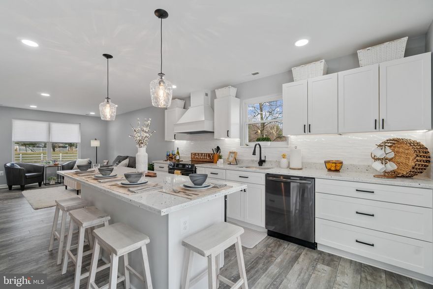 BRING ALL OFFERS! Pinterest Perfect, Beautifully Remodeled 4 Bedroom, 2 Full Bath Rancher Offering an Inviting Coastal Curb Appeal - Freshly Landscaped Front with River Rock Beds, Hardscaped Walk-way, Fabulous New Covered Entry-way with Portico and Freshly Resurfaced Driveway. The Beautifully Remodeled Interior with Gorgeous Bright White Kitchen, Soft Close Cabinets and Large Center Island with Ample Seating, High End Black Stainless Appliances, Granite Counters, Subway Tile Backsplash, Pendant Lighting, Modern Black Hardware and a Large Pantry with Plenty of Storage makes this Truly the Heart of this Home!  The Open, Light filled Living Room offers a Neutral Palette with Recessed Lighting and Waterproof Luxury Plank Vinyl Flooring. The New Sliding Door off of the Kitchen Leads to the Large Deck and partially Fenced Rear Yard Perfect for Outdoor Entertaining! With 4 Nicely sized bedrooms and 2 Beautifully Remodeled Full Baths with Custom Tile Surrounds and Modern Black Fixtures on the Main, this is One Level Living at it's BEST!  The New Windows and New HVAC provide Comfort all Year Round!  The Primary Bedroom has an attached Jack & Jill Bath with Custom Step in Shower, Glass Shower Door and Built-ins for extra Storage.  The Front and Back Yards have been Freshly Seeded and a new Shed added to house all of your Outdoor Tools. This Fabulous Remodel is located in sought after Oyster Harbor which is a Water Privileged Community offering an Amazing Private Gated Beach, 2 Playgrounds, 3 Marinas open to Residents, Boat Ramp on Oyster Creek, a Fishing Pier along the inlet into Oyster Creek and is a Private Community located in a Special Taxing District. Don't Let This One Get Away! Schedule Your Showing Today!