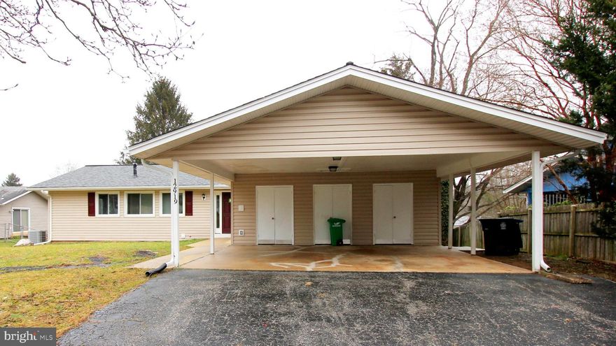 This is a MUST SEE for anyone looking for a move-in ready home in the Bowie area.  Freshly painted throughout, refinished hardwood floors and a flowing floor plan that keeps the public and personal space separate but allows easy access for all.  The living room is a sunny space with a fireplace just off the dining room and kitchen. The previously updated kitchen features granite counters, white cabinets, stainless steel appliances and space for a small table. The main level familiy room opens out to the spacious deck with a great view of the fenced backyard where you can sit and have a meal or just watch the kiddos or pups playing.  The other wing of the home is the more private side with three bedrooms and two baths, while the lower level features a large recreation room and a bedrooms with a pass-through connecting room that could be a home office. With the majority of the home on one level, this could be a good fit for anyone with a family member who has mobility issues. Parking for two cars in the carport and lots of space for gardening out front. Don't wait too long, this will be gone before you know it.