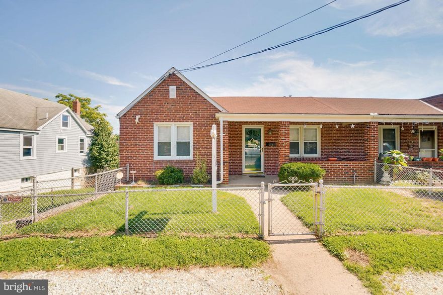 Brick Duplex in Baltimore County. Don't let the sq ft listed fool you, You will be pleasantly surprised with the size rooms and amount of storage in this freshly painted home. The main level has the living room, kitchen, 3 bedrooms and a full bath. The lower level has a family room, half bath, bedroom, laundry room and a ton of storage areas. There is a walkout to the side of the house from the basement. All appliances will stay (refrig., microwave, stove, dishwasher, washer, dryer, extra refrigerator in LL). There is a security alarm you can activate.  Convenient 2 car driveway and street parking. The yard has a fenced front with a covered porch, and the back yard has a wood privacy fence and patio area. The playset can stay or the seller will have removed. Ready for you to move in!