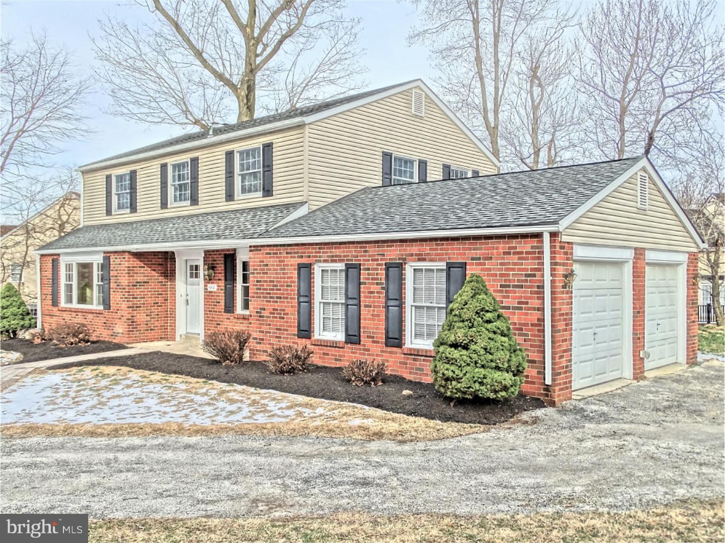 This classic 2 story is tucked back on a quiet 1/2 acre lot & offers warm & sunny rooms, fresh paint & new carpet throughout. Updated kitchen w/glass tile backsplash & w/appliances (most are new), 1st floor family room w/wood burning fireplace, nice views & master suite w/hardwood floors, her cedar closets & beautifully tiled bathroom. Other features include crown molding, wainscoting, recessed lighting, full basement waiting to be finished & 2 car garage.