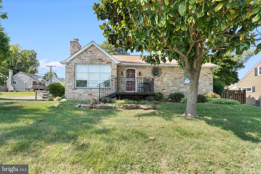 Welcome to this outstanding stone rancher located in Catonsville.  This home has multitude of updates including but not limited to an updated kitchen with epoxy covered concrete countertops, large pantry/coat closet with pocket door and motion sensor lights, cooktop and double oven.  The living room has hardwood floors, and a fireplace converted into gas.  There are remote ceilings fans throughout the house, arched doorways and motion sensor lights in his/her closets with built-ins.

The lower level boasts a newly carpeted walk out basement with, a bedroom, an office area and a full bathroom, a storage area and a CUSTOM-BUILT SAUNA FOR 4 PEOPLE.  There are three (3) sump pumps and a French Drain System.   Additionally, a built in 6,000 pound safe conveys with the property.

The comfortable exterior has a covered patio with a remote ceiling fan overlooking the beautifully landscaped yard.  There's a 20X24 two car heated garage and workshop with 100 AMP Sub Panel, and exterior outlets for a 30 AMP RV service.  Attached to the garage is a 16x16 addition that fits an additional car/motorcycle.  The 24' x 67' driveway comfortably fits (6) vehicles.

All the windows were updated in 2015 to triple pane, Low E Casement, which eliminates any outside noise and keeps the house toasty in the winter and cool in the summer.  The property has a tankless hot water heater, a high efficiency HVAC system, upgraded natural gas service to accommodate a Whole House Natural Gas Generator.  The roof was replaced in 2011 with a transferable warranty. There's a wired/self-monitoring home security system with a separate HD Video system and onsite and offsite recording.  The bottom line is this home has it all.