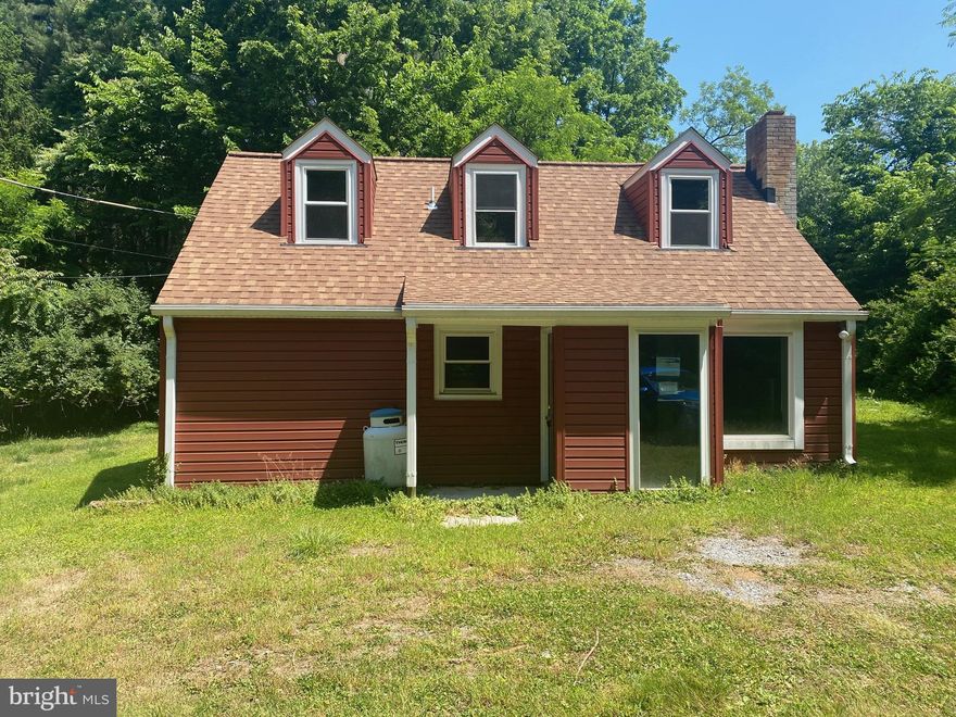 MULTIPLE OFFERS - HIGHEST AND BEST DUE 7/28 at 1 PM. This charming Cape Cod features newer siding, roof, and gutters. The covered from porch lets you enjoy the large front yard. The home opens in a nice foyer. The main level features a spacious living room with lots of natural light, easy care laminate floors and a fireplace with woodstove insert. You'll be nice and toasty on those chilly nights. The u-shaped kitchen is set up for efficiency. It features oak cabinetry and a stainless-steel sink.  You have a breakfast nook with bright window and staircase. There is a large living room on the back of the house with a patio access. This could easily be utilized as a third bedroom if desired. The hall bath features a tub/shower combo and 3 ft single bowl vanity. There is a large utility room with a door to your side yard. Upstairs you have 2 large bedrooms with good natural light. In the hall there is an unfinished half-bath or walk-in closet measuring 5 ft x 5 ft. There is a nice large closet already set up measuring 3 ft x 4 ft. This lovely house sits on just under 1/4 acre of level land. Plenty of space to enjoy with your pets or garden. This home has so much potential! Call to see it today!
All contracts and offers are subject to final review and approval of seller, all offers or contracts are not binding unless the entire agreement is ratified by all parties.  All offers must be submitted by the Buyer's agent via the RES.NET Agent Portal. If your offer is accepted, you agree to be responsible for an offer submission technology fee of $150.00. The fee will be included on the closing disclosure and paid at the closing of the transaction.  AS-IS WHERE IS, SELLER AND BROKER MAKE NO WARRANTIES OR GUARANTEES.