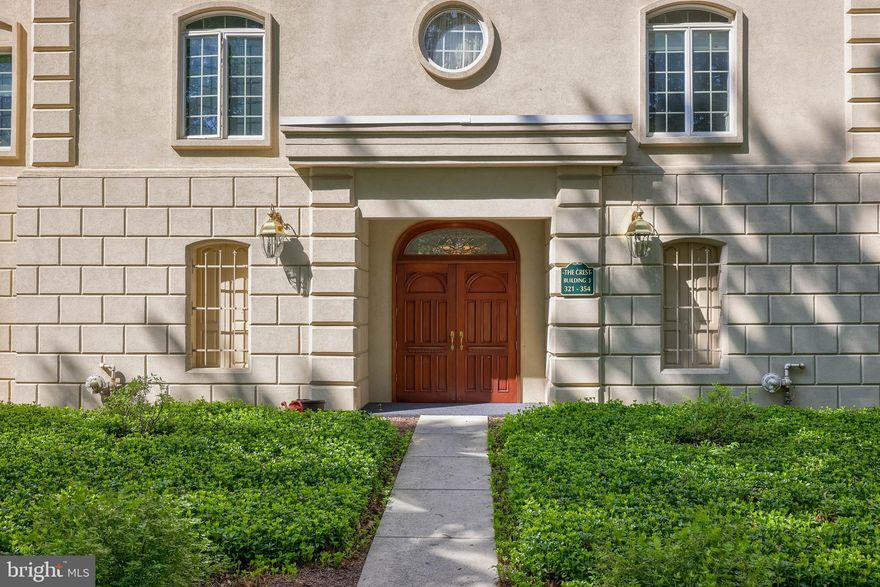 Experience comfort and convenience in this beautifully maintained condo located in The Crest, one of the most desirable communities within the Dallastown School District. Ideally situated just minutes from York Hospital, York College, I-83, and downtown York’s shops and restaurants, this peaceful neighborhood offers a secluded, wooded atmosphere with manicured grounds, scenic walking paths, a gazebo, and relaxing outdoor seating areas. Inside the secure building, you’ll appreciate the ease of elevator access and reliable maintenance. The nearly 2,000-square-foot home features spacious bedrooms with walk-in closets, 2 full bathrooms plus a powder room, a light-filled living room with an electric fireplace, and den or office with built-in sliding French doors. The kitchen boasts cherry cabinetry and granite counters with stainless steel appliances.  The primary suite includes private balcony access and a spa-like en-suite bath with a Jacuzzi tub and walk-in shower. There is a separate laundry room in the unit along with reserved garage parking at the building’s entrance level along & additional outside parking for your guest. Don’t miss your chance to own in this tranquil yet connected community!