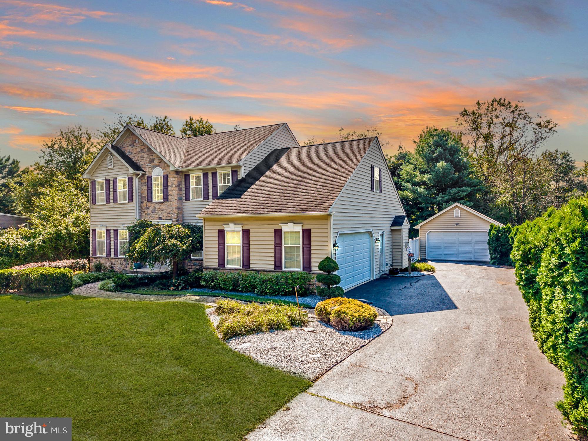79 Andover Dr is an exceptional Glenmoore property that blends elegant design with modern upgrades and versatile living spaces. Built with detail in mind, this 4-bedroom, 3.5-bath home feels as fresh and refined as new construction—yet offers the ease of a finished home that’s move-in ready.
Step inside to a stately two-story foyer that introduces the home’s scale and style. To one side, a private office enclosed by French doors offers a quiet workspace. To the other, a welcoming formal living room leads into the dining room, detailed with wainscoting, and chair rail. At the back of the home, the kitchen and family room span the width of the house, creating a warm and inviting center of daily life. The chef’s kitchen, with granite counters, updated appliances, and ample cabinetry, flows seamlessly into the family room with its soaring cathedral ceiling and floor-to-ceiling stone fireplace.
The primary suite is a retreat of its own, complete with a sitting area, soaking tub, and separate stall shower. Three additional ample sized bedrooms and an updated hall bath provide plenty of space and comfort.
The finished basement adds even more functionality with an in-law suite featuring a kitchenette, full bath, and walk-out access to the attached garage with a beautiful propane fireplace to add to the ambiance. This makes it ideal for guests, extended family, or multi-purpose use.
A detached, climate-controlled garage with its own half bath sets this home apart. Perfect for hobbies, a home business, or a gym, it offers heated parking and versatile use. Outdoors, a Trex deck with hot tub featuring a waterfall overlooks the privacy fenced backyard, offering a private retreat for relaxation and entertaining. A whole-house generator ensures uninterrupted comfort. Newer HVAC, installed in 2019, adds efficiency and peace of mind.
Buyer to verify all measurements to satisfy self.