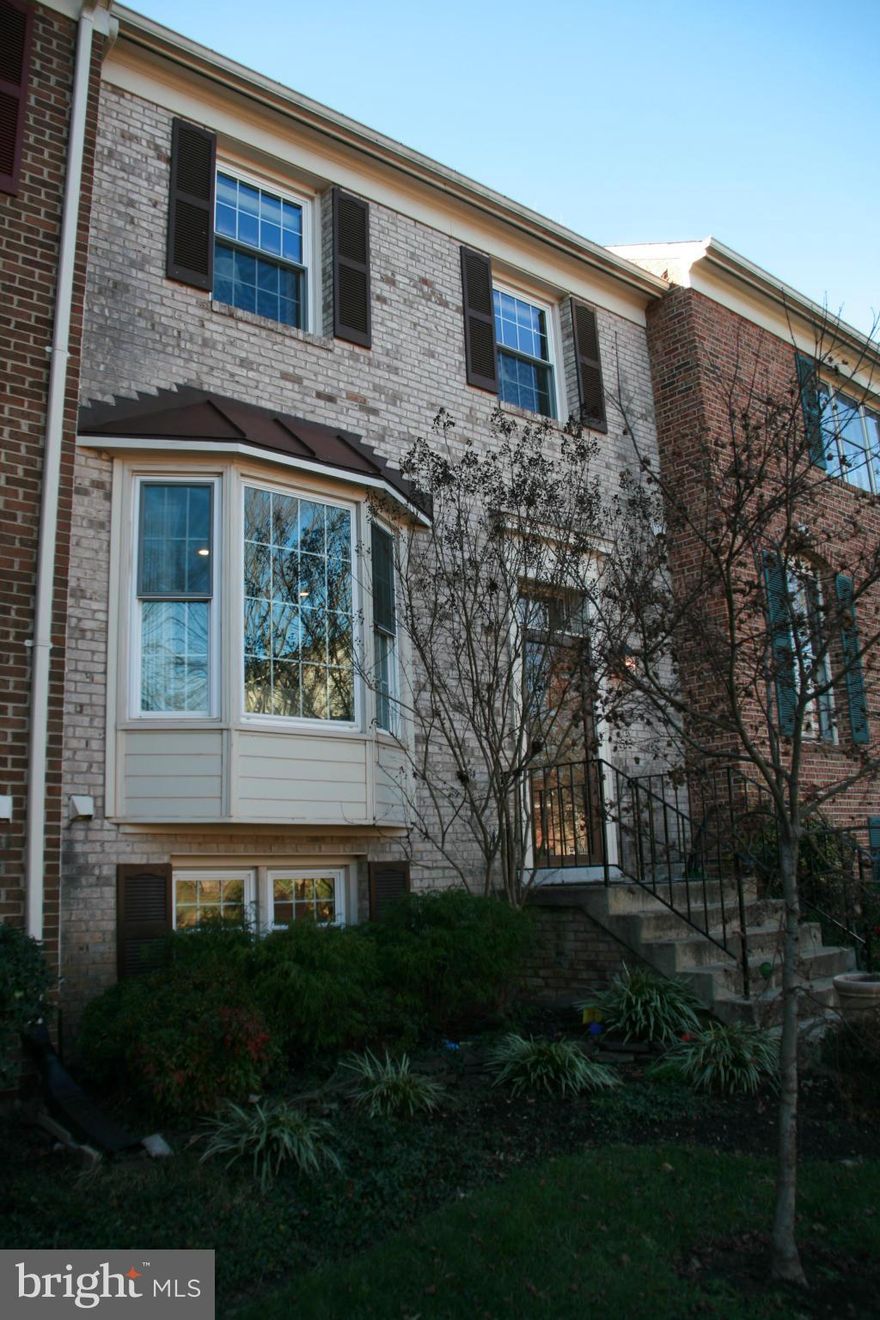 Luxury + convenience! Gorgeous upgraded 3 BR + office/den TH with fine finishes. Must see kitchen with attached Breakfast Room: granite, stainless, ceramic + farmhouse sink. Sep. dining and living rm w/hardwood floor. Fully finished basement w/family room and bonus den/office w/full bath. Tranquil yard w/brick, back to woods, adj to trails. Minutes to Fairfax, Merrifield shopping, Vienna metro.