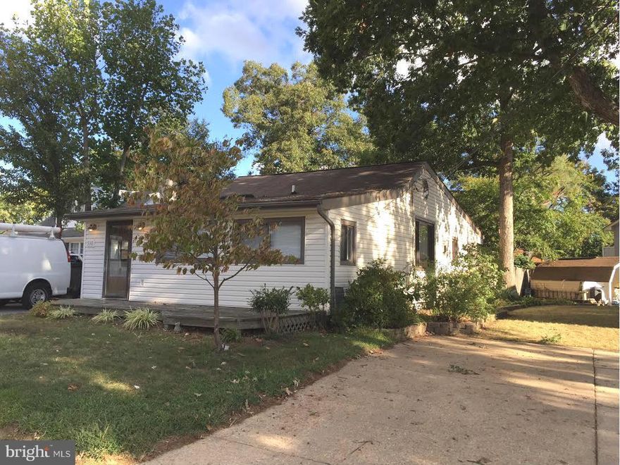 Updated & Remodeled with an open floor plan. New Carpet in oversized bedrooms, dual closets and cathedrial ceilings. Bamboo wood floor in family room with a pellet stove just in time for winter. Enormous eat in kitchen with ceramic tiled floor & corian counters. Huge Shed for storage and owner will maintain lawn. Waterview from back deck and two houses away from community beach & fishing pier.