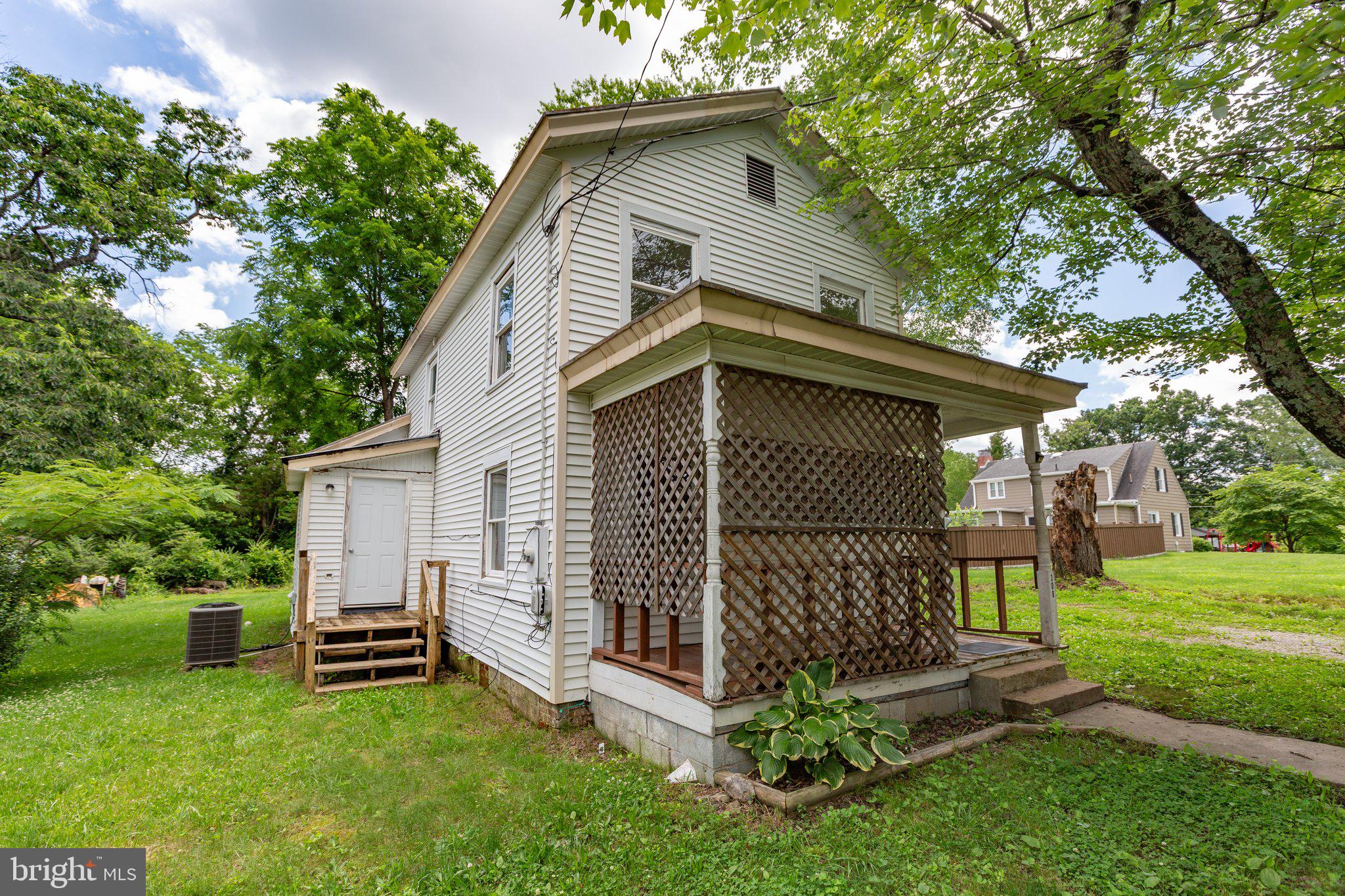 Charming and updated 3-bedroom, 2-bath home originally built in 1910 and fully renovated in 2017. This two-story home has historic character with modern updates, featuring hardwood flooring in the front living room, luxury vinyl plank in the kitchen, and stainless steel appliances paired with granite countertops. The layout includes a convenient jack-and-jill bathroom connecting two upstairs bedrooms. Washer and dryer are included. Enjoy the covered front porch and spacious yard with mature trees. Located on a quiet street with a mix of established homes and new development nearby—this one offers both value and potential.