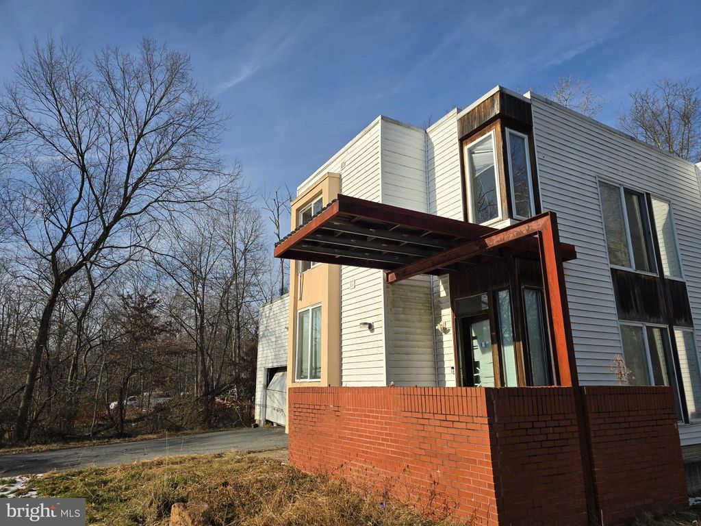 Photo of 4814 Oakland Park Road, RANDALLSTOWN, MD 21133 (MLS # MDBC2150060)