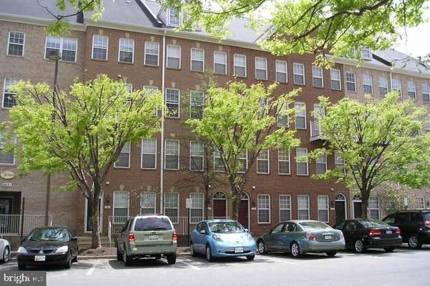 Fantastic commuter location! Located directly across from the Dunn Loring Metro and surrounded by conveniences like Harris Teeter, Starbucks, and a variety of restaurants, with the Mosaic District only minutes away. Available September 1.
This two-level condo features 2 extra large bedrooms, each with an ensuite bathroom, and upper level laundry. The unit includes one assigned below-ground garage parking spot with garage access right off of unit, while also offering the option of entering through the front door from street level.
Inside, bamboo flooring flows throughout the main level. The open layout features a spacious living room connected to the kitchen, dining area, and a cozy family room with fireplace and built-in shelving. Enjoy two balconies—one off the family room and another accessible from the upstairs bedroom.
The primary suite includes a bath with both a soaking tub and a separate walk-in shower. A dedicated laundry room with storage is located on the upper level.
This home combines generous interior space with unbeatable access to major routes (66 and 50), Mosaic District, and the Metro. Showing by appointment only. Contact Listing Agent with any questions.