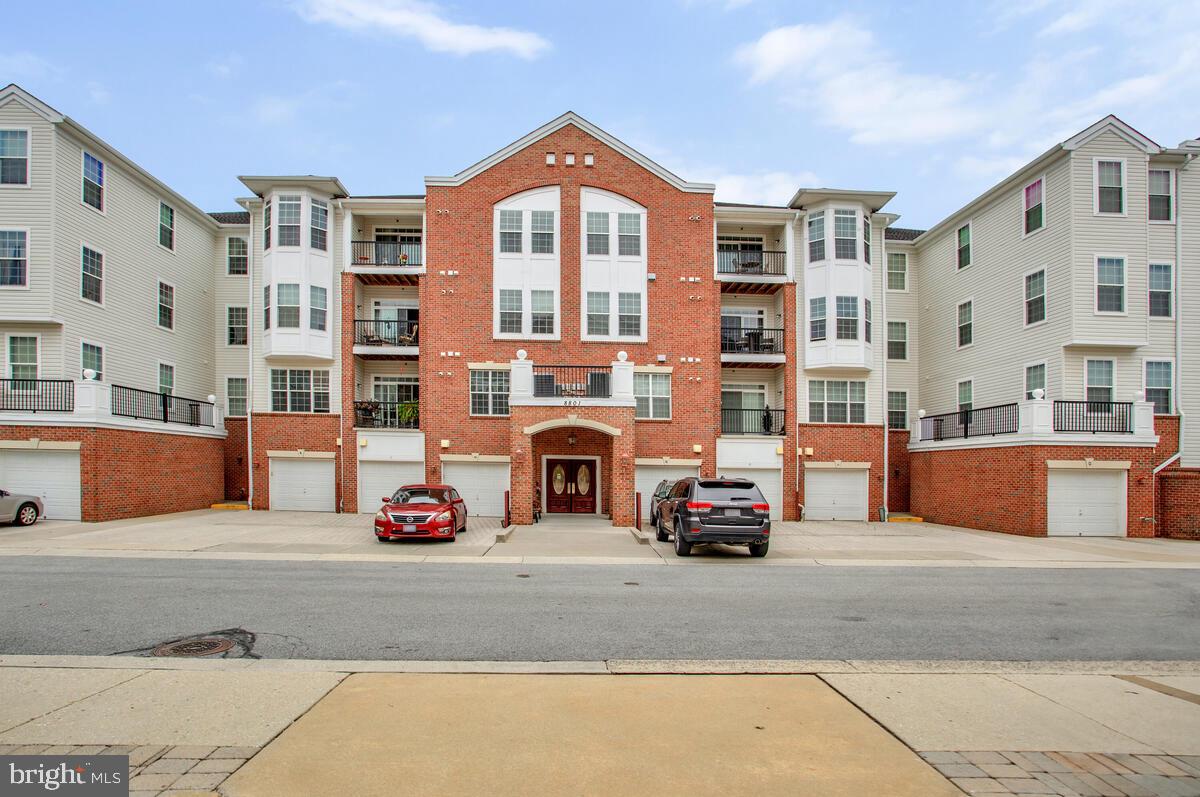 Top level 55+ easy living condo in a secure elevator building with your very own garage inside of the building & in ultra convenient Jefferson Place close to all the daily amenities that you seek! Your lifestyle will immediately be elevated & carefree - the central living & dining room area offers plenty of space for daily living & hosting gatherings with family, neighbors, & friends; the separate den gives you a great spot to do computer work, watch television, read & reflect; the balcony is perfect for a morning coffee or evening refreshment while taking in the fresh air. The generous primary bedroom offers a sitting area & ensuite bath; the 2nd bedroom has ample closet space + access to the 2nd full bath & the laundry room which provides for additional storage capacity too. The thoughtful owner replaced the HVAC system in 6/2022 & the gas water heater in 3/2022; washer & dryer in 2023; & dishwasher in 2025. Now it is your time to trade in the tedious house chores for the kind of life that you deserve.