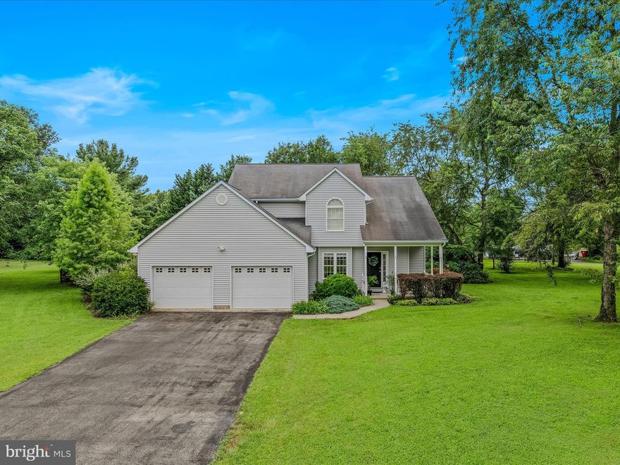 Welcome to this beautifully maintained 3-bedroom, 2.5-bath single-family home situated on a spacious 0.89-acre corner lot in an established neighborhood, centrally located between Martinsburg and Shepherdstown. Nestled among mature trees, this property offers privacy, curb appeal, and a fully fenced rear yard—perfect for pets, entertaining, or peaceful relaxation.

Inside, you'll find hardwood floors throughout the main level, a thoughtfully designed kitchen featuring granite countertops, a large walk-in pantry, and ample cabinet space. With a beautiful gas fireplace in the family room and a separate formal living area, there are numerous places to socialize or sneak away. Enjoy your morning coffee or unwind in the evening on the serene screened-in porch, which overlooks beautifully landscaped flower gardens—an ideal setting for outdoor enjoyment in every season.

The home's layout is perfect for both daily living and hosting guests, with comfortable bedrooms and well-appointed bathrooms. Additional highlights include a two-car garage, a full unfinished basement, and charming architectural details throughout.

Conveniently located near shopping, dining, schools, and commuter routes, this home combines classic charm with modern amenities. Don’t miss your chance to own this move-in-ready gem!