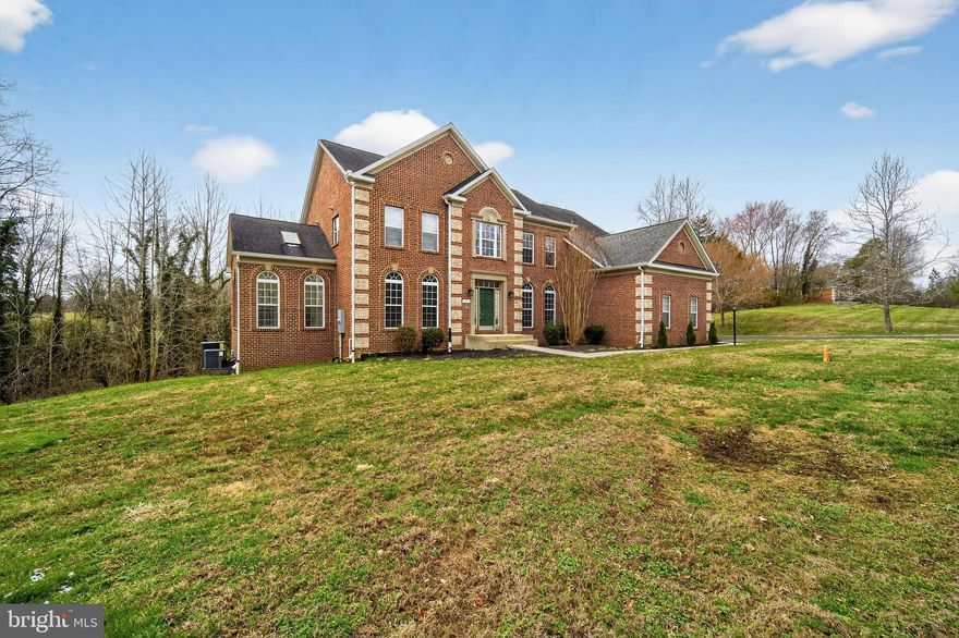 Welcome to an extraordinary private retreat nestled in the heart of Southern Prince George’s County. Set on over five breathtaking acres of wooded land, this stunning estate at 16101 Venice Road in Aquasco offers the perfect balance of luxury, privacy, and serene country living—while still being conveniently located near the best of the Washington, D.C. metro region.

From the moment you arrive, the property captivates with its expansive grounds, peaceful wooded surroundings, and sense of quiet exclusivity. A long approach leads you to a stately residence designed for both elegant living and comfortable everyday life.

Step through the front doors into a dramatic two-story foyer that immediately sets the tone for the home’s sophistication and scale. Sunlight pours into the space, highlighting the architectural beauty and the striking dual staircases that create a grand, unforgettable first impression. The thoughtful layout flows seamlessly throughout the home, offering generous spaces for entertaining, gathering, and relaxing.

At the heart of the home is the beautifully updated kitchen, designed with both functionality and style in mind. Featuring modern updates, abundant cabinetry, and ample preparation space, this kitchen is ideal for everything from casual weekday meals to hosting memorable gatherings with friends and family. The open feel makes it the perfect hub for conversation and connection.

This impressive residence features four spacious bedrooms and three full bathrooms plus a convenient powder room, providing comfort and flexibility for family, guests, or home office needs. Each bedroom offers generous proportions and natural light, creating restful private retreats throughout the home.
The living spaces are designed to take advantage of the surrounding natural beauty. Large windows frame peaceful views of the expansive wooded lot, allowing you to feel connected to nature year-round. Whether enjoying a quiet morning coffee, hosting a celebration, or simply unwinding at the end of the day, the property offers a level of tranquility that is increasingly rare.

With over five acres of land, and no tree conservation or protective space, the possibilities are endless. The property provides incredible outdoor space for recreation, gardening, outdoor entertaining, or simply enjoying the privacy and calm that only a property of this size can offer. The wooded setting enhances the sense of seclusion while creating a picturesque landscape in every season.

Despite its peaceful setting, Aquasco offers convenient access to many desirable destinations. The home is located within easy driving distance of Upper Marlboro, Brandywine, and Bowie, providing access to shopping, dining, and everyday conveniences. Nearby attractions include Cedarville State Forest, where residents enjoy hiking, biking, horseback riding, and nature exploration. Golf enthusiasts will appreciate the proximity to local courses, while commuters will benefit from access to Route 301, Route 4, and Route 5, connecting easily to Washington, D.C., Joint Base Andrews, and Northern Virginia.

For those seeking a lifestyle that combines space, privacy, elegance, and accessibility, this remarkable Aquasco property delivers it all. Homes offering this level of acreage, architectural presence, and modern updates rarely become available.

16101 Venice Road is more than a home—it is a private estate, a peaceful escape, and a place where unforgettable memories are waiting to be made.

Schedule your private showing and experience the beauty, scale, and serenity of this exceptional property for yourself.