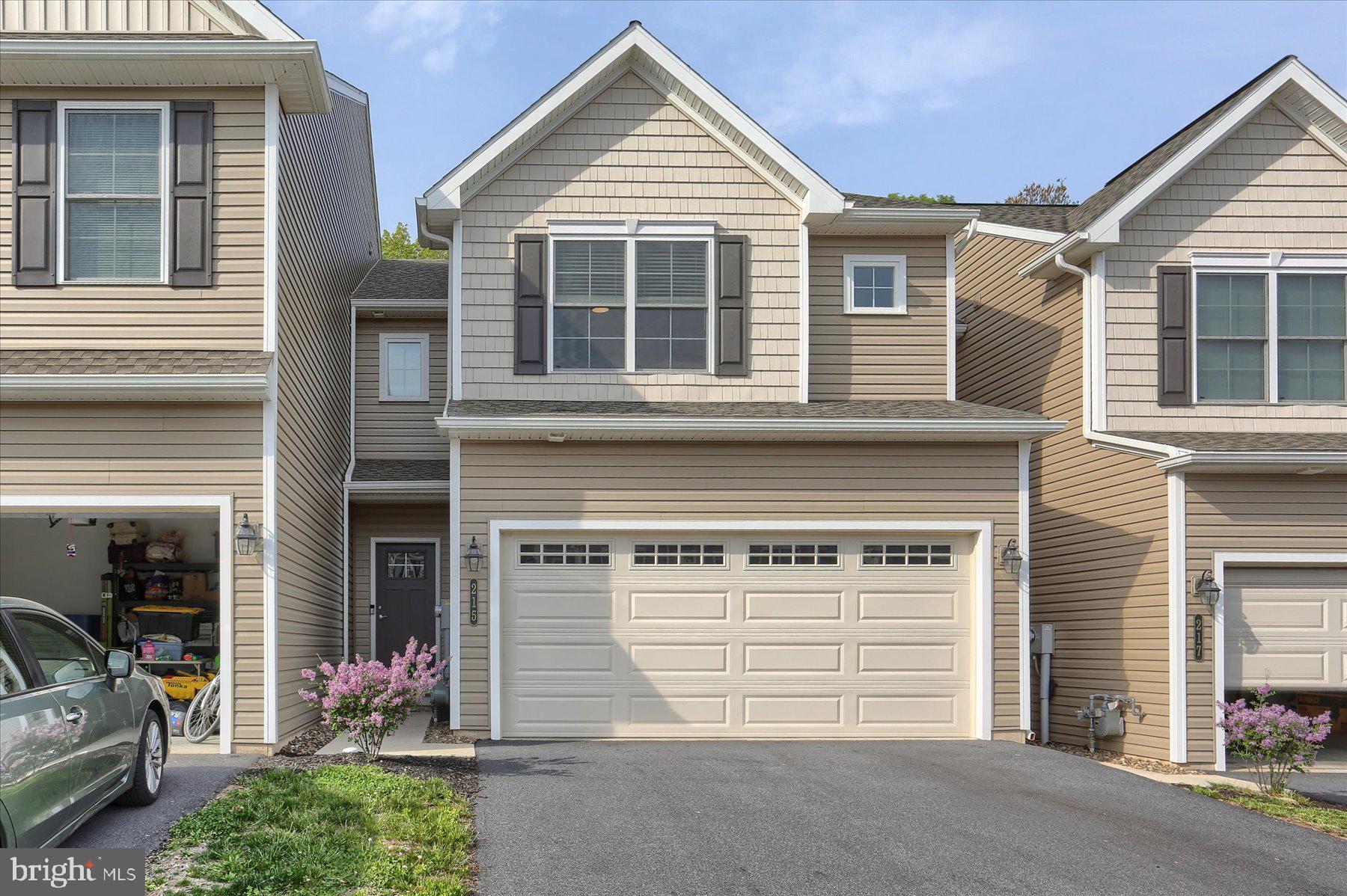 NOW PRICED BELOW NEW CONSTRUCTION,,,,,,, PLUS....THIS UNIT HAS ADITIONAL UPGRADES. This lovely townhome, less than 2 years old, is located in the Woodland Hills development. Home is just like new with three bedrooms, two and a half baths. Gas utilities are easy on the monthly bills and the location is convenient for shopping, groceries and access to main highways. The galley kitchen with breakfast bar and large pantry - utility closet - is open to a dining area and family room presenting an open and bright concept living space. Second floor laundry and 3 bedrooms, each with good sized closets. Two full sized baths; the primary bath with double sinks. Two car garage for your vehicles and extra exterior storage. Lower level is ready to be finished if you desire. Spacious area for interior storage. Check it out today!