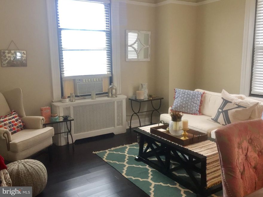 One bedroom plus den (can easily be used as a second bedroom), two bathroom sun-drenched home with southwestern views at The Carlyle! The home features hardwood floors throughout and an updated kitchen with wood cabinetry, stainless steel appliances and granite countertops. The spacious primary bedroom enjoys use of an ensuite bathroom and large wall closet. There is a study/den that can easily be used as a second bedroom, that also enjoys use of an ensuite bathroom.  The Carlyle is a pet-friendly, doorman building only one block from Rittenhouse Square. Rent includes the security of a 24-hour doorman and use of the building's state-of-the-art gym. Tenants are responsible for paying all utilities. The Carlyle is a short walk from 175 restaurants, and over 199 retailers as well as the Market Street office corridor, The Avenue of the Arts and University City.