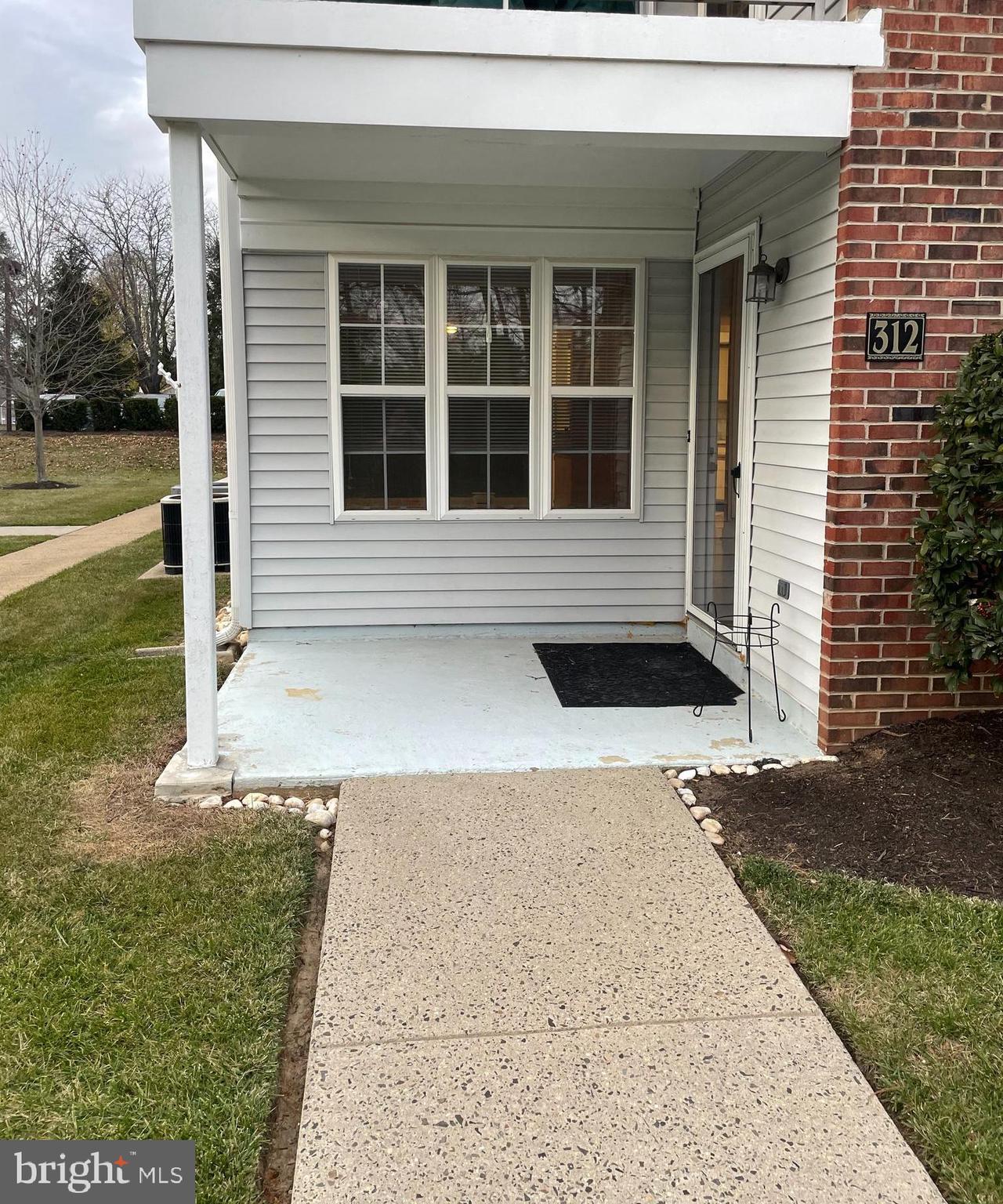 You'll love this first floor, 2 bedroom 2 full bath condo located in the Quarters, a 55 and over community of Newtown Gate. Upon entry you'll walk into a spacious sun-filled living area that opens right into the Dining and Kitchen areas. As you turn down the hall you will find the full Hall Bath across from the laundry area. Further down is the large 2nd bedroom with its own walk in closet, then you'll continue on to the Primary Bedroom with En-Suite Bathroom and plenty of closet space in the large Walk-In Closet. This unit features beautiful wood floors, in unit washer/dryer, microwave, walk-in closets, gas heat/cooking, tennis courts, walking trails and sidewalks galore, with ample parking. Just a short walk from everything Newtown Boro has to offer, and Grocery store, Pharmacy, and much more are just across the Bypass in the Summit Square shopping center. Included in your rent is water, sewer, trash removal, Lawncare, Snow Removal, and Condo Fees. NOTE: Per condo rules, no dogs allowed, ok to have 1 cat.