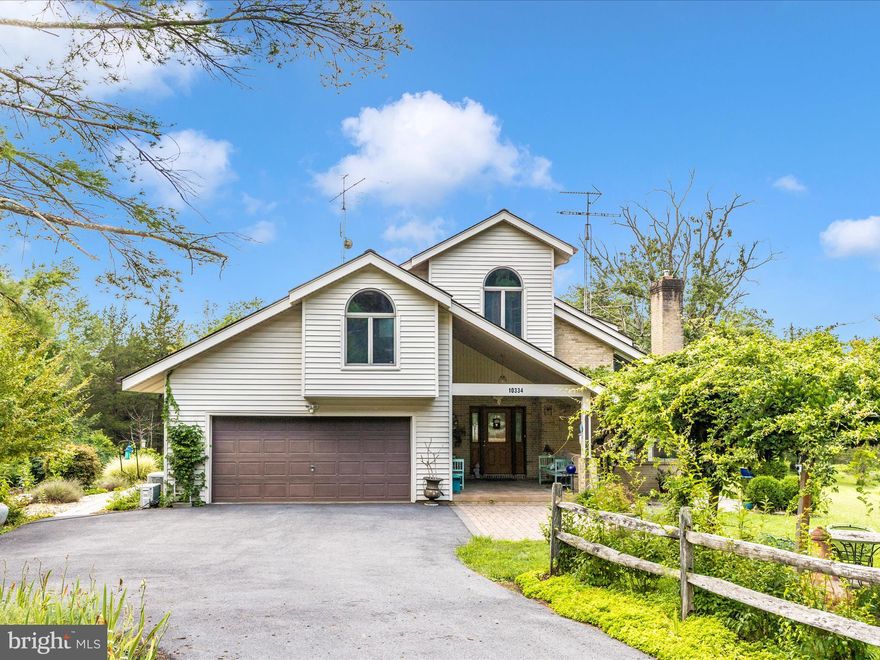 PRICE DROP!! MOTIVATED SELLER - 
Welcome to your private retreat! Proudly offered by the original owner, this beautifully maintained 4BR/2BA custom contemporary home sits atop a scenic ridge on 28 private acres of open pasture, mature woodlands, and a serene, spring-fed pond stocked with bass and bluegill.

Inside, the 3,500 sq ft open floor plan showcases hardwood floors, vaulted ceilings, a sunken living room with fireplace and wood stove insert, and a sun-filled dining area. The chef’s kitchen features stainless steel appliances, custom cabinetry, an oversized island, and a bright skylight — perfect for gatherings.

The main level offers two bedrooms, a large updated full bath with a jetted tub and separate walk-in shower, and a tranquil solarium complete with an indoor, window-surrounded hot tub. Just steps from the solarium, a private patio with a retractable awning creates the ideal spot for outdoor relaxation.

Upstairs, the spacious primary suite offers a remodeled spa bath, private balcony, cozy sitting area with built-ins, and a versatile fourth bedroom or office. The lower level adds 750 sq ft of flexible space for storage, a workshop, or hobbies.

Outdoor enthusiasts will love the mix of open fields and woodlands, including a certified Maryland Tree Farm with 26 acres of white pine and hardwoods — with certification easily reinstated through the Maryland Forestry Service, offering potential tax benefits.

Special features include a half-acre, spring-fed pond, a 24x30 pole barn, 12x24 equipment shed, garden shed, and a matched staged shooting range for recreation. For ham radio enthusiasts, an 80’ RHON tower is fully in place.

This home is designed for comfort and resilience, equipped with two heat pump HVAC systems, two mini-split units, a 20kW whole-house propane generator with automatic transfer, and a 10-year-old architectural roof with a photovoltaic solar array to enhance energy efficiency and sustainability.

An exceptional opportunity for nature lovers, hobbyists, or those seeking a peaceful, self-sufficient lifestyle — just minutes from town yet a world away.

Your private escape awaits!  Schedule a private showing.