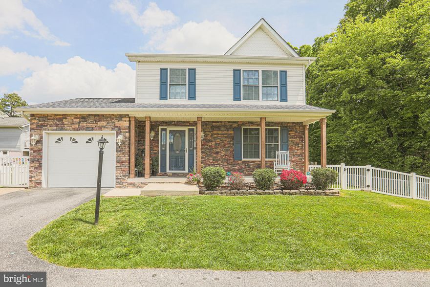 WOW! Beautiful single family home located in Silver Spring Terrace Just Listed! Over 2500 sq ft of living space! Enjoy cooking and making memories in this bright and modern kitchen containing natural quartz counters, 6 person breakfast bar, 42" cabinets, tile backsplash, double oven, pantry and more! Just steps from the kitchen you enter the 16x27 ft family room, ideal for entertaining. The main level also includes a living room equipped with a gas fireplace and lots of natural light.  Watch all the big games in the lower level recreation room  with custom dry bar and full tile bath. This gorgeous home also offers 3 generous sized bedrooms,  primary bathroom, luxury vinyl plank flooring throughout the main and lower levels, recess lighting, utility room, newer interior doors, fixtures, hardware, deck, vinyl fencing and so much more.  No HOA! Schedule your showing so you don't miss this one! A true turnkey home!