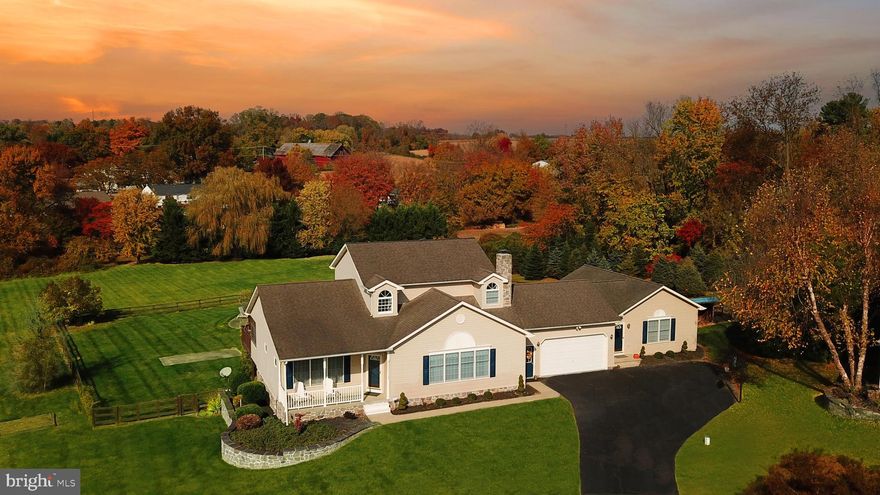 COMING SOON!!! Spectacular rancher on a cul-de-sac with attached in-law suite loaded with amenities and sitting on private 2 acres lot! This home features an open floor plan with a large family room with hardwood and carpet inlay, stone faced wood burn fireplace, renovated gourmet kitchen (2022) with hardwood floors, oversized island with breakfast bar, butcher block, bar sink and beverage fridge. White shaker cabinets with soft close, quartz countertops, ceramic backsplash, and state of the art stainless steel appliances. The crown jewel of this kitchen is the commercial style 6 burner gas stove (2024), with double convection oven and DCS vented range - every chef's dream!  Offloading groceries is a breeze with interior access to garage from kitchen. Walk-in pantry is just around the corner with lots of wooden shelves and a pocket door. Dining room has hardwood floors and sliders leading to a sprawling painted wood deck with dining area, grilling area, pergolas, and steps down to yard. Spacious main level bedroom boasts cathedral ceilings with ceiling fan, full size windows, walk-in closet, ensuite bathroom with shower/tub enclosure, double vanity, and screened-in porch with 2-person hot tub right off of primary bedroom.  Laundry room and half bath completes the main level. Three large bedrooms and an additional full bathroom are located on the second floor. The lower level is an entertainers' paradise with a large recreation room, a full service pub style wet bar with kegerator, ice maker, and a wine cellar room with vinotemp! There is also find a home office in the basement! Bring the popcorn and watch a movie in the media room with theater like chairs, built-in surround sound system, lighted tray ceiling and large flat screen tv!  Basement bath has jetted garden tub, steam walk-in shower with bench and niche, single sink with vessel sink and linen closet. The sliders off of the rec room lead to a  concrete patio and walkway to the beautiful in-ground pool and fully fenced back yard. There is an attached two car garage with a utility sink and rear door to back yard.  Attached in-law suite with its own separate entrance sits conveniently on the other side of the garage. The in-law suite has a living room / kitchen combo with hardwood floors, one bedroom with sliders  to its own private deck, a full bathroom with curbless shower, and a laundry with a stacked washer and dryer. Don't miss out on this one of a kind home!