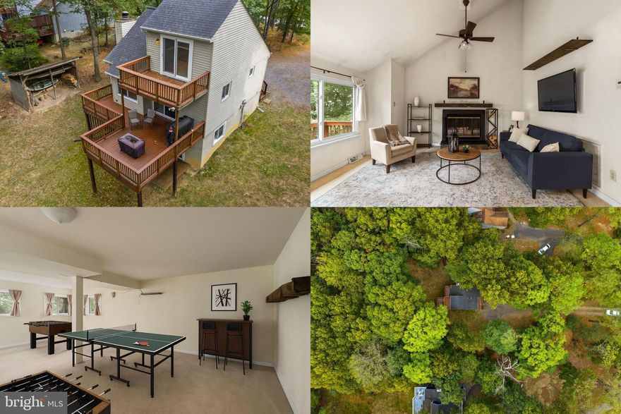 Welcome to 270 Atwood Dr, a unique tri-level home nestled on a private, tree-lined 1-acre lot in Gerrardstown. The entire upper level offers a spacious bedroom with its own freshly stained deck overlooking the woods. On the main level you’ll find another bedroom, the full bath, and an open kitchen and living area that flows to a second freshly stained deck — perfect for entertaining or relaxing outdoors. The fully finished lower level provides endless possibilities for additional living space, a home gym, office, or even another bedroom. With water access already in place, similar homes in the area have added a second bath here — giving buyers an excellent opportunity to expand and increase value. Recent updates include a new roof (2019) with transferable warranty, new HVAC (2020/2021), new sliding glass door, and all appliances replaced since 2019. Outdoor living shines with multiple decks, a fire pit, and plenty of privacy. Conveyances include a mounted flat-screen TV, grill,  cute deer antler chandelier, deck chairs, fire pit, all appliances (including Breville Combi-Wave microwave), tool cabinet, work table in the basement, shed, and chest freezer. With its flexible layout, modern updates, and private wooded setting, 270 Atwood Dr is ready to welcome you home.