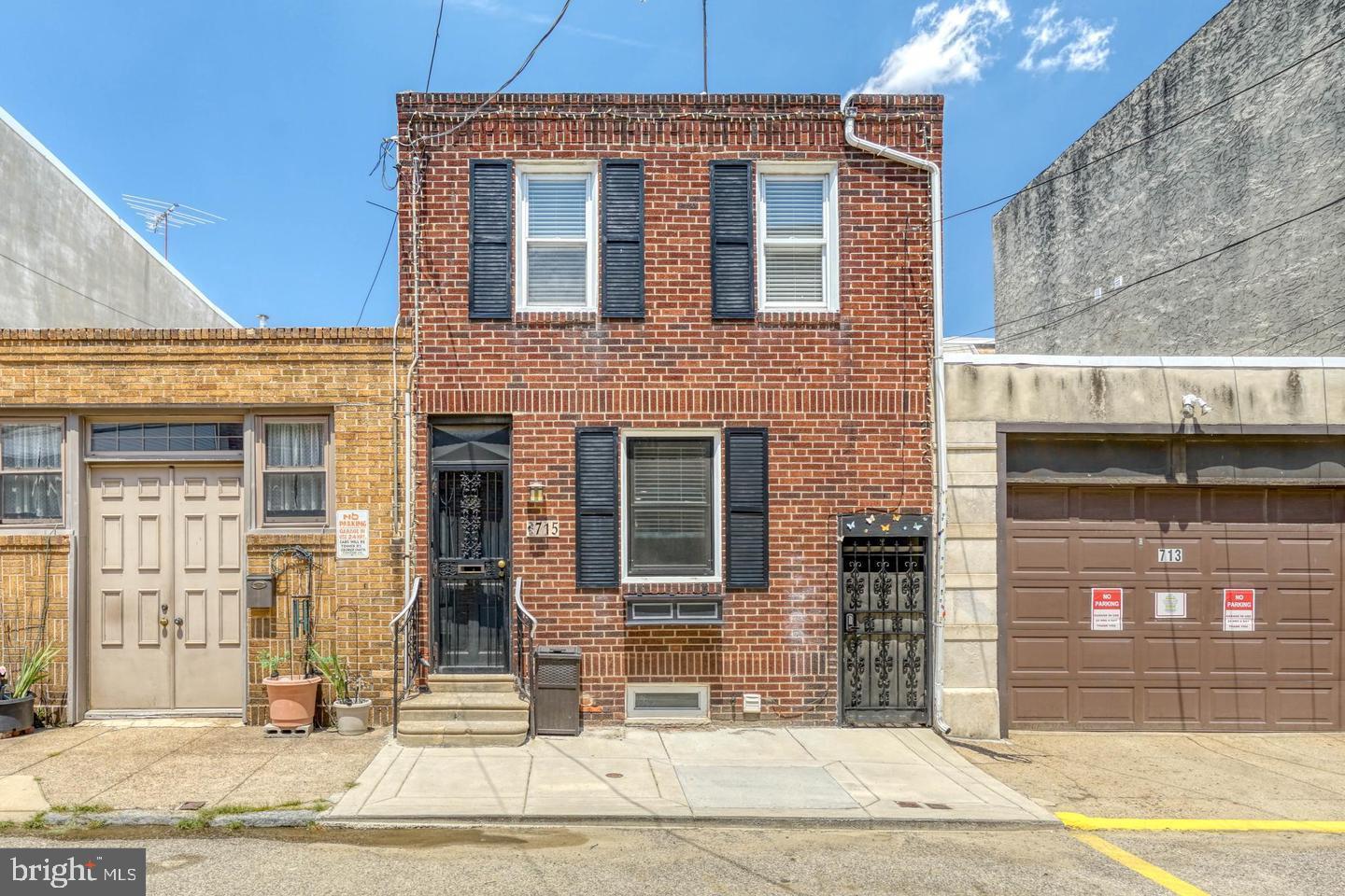 A quiet tree-lined block in the heart of Passyunk Square plays host to 715 Manton St. This updated 2-story home offers 2 beds, 1 bath, and a finished basement. The front of the home features a handsome brick façade with beautiful floors and recessed lights extending throughout. There's plenty of room for separate living and dining areas. The kitchen has lots of counter and cabinet space, stainless steel appliances, and a pantry. The home's finished basement holds the laundry, a mechanical closet, and extra storage space. On the second level, there's a large carpeted bedroom with two tall windows at the front. At the rear, there's another large bedroom with a bonus space perfect for an office or walk-in closet. A full bathroom completes the level. Not only is 715 Manton St a fantastic home, but its Passyunk Square location also earns a Walk Score of 96! Booming E Passyunk Ave, lined with top-rated restaurants, and the famed 9th St Italian Market are both steps away. Capitolo Playground and Gold Star Park are also within a few blocks. Plus, there's easy access to public transit, Washington Ave, I-95, and South Jersey. Schedule your in-person or virtual tour today! No Dogs, only Cats allowed. DO NOT Enter the backyard. There is no backyard/outdoor space included in this property.