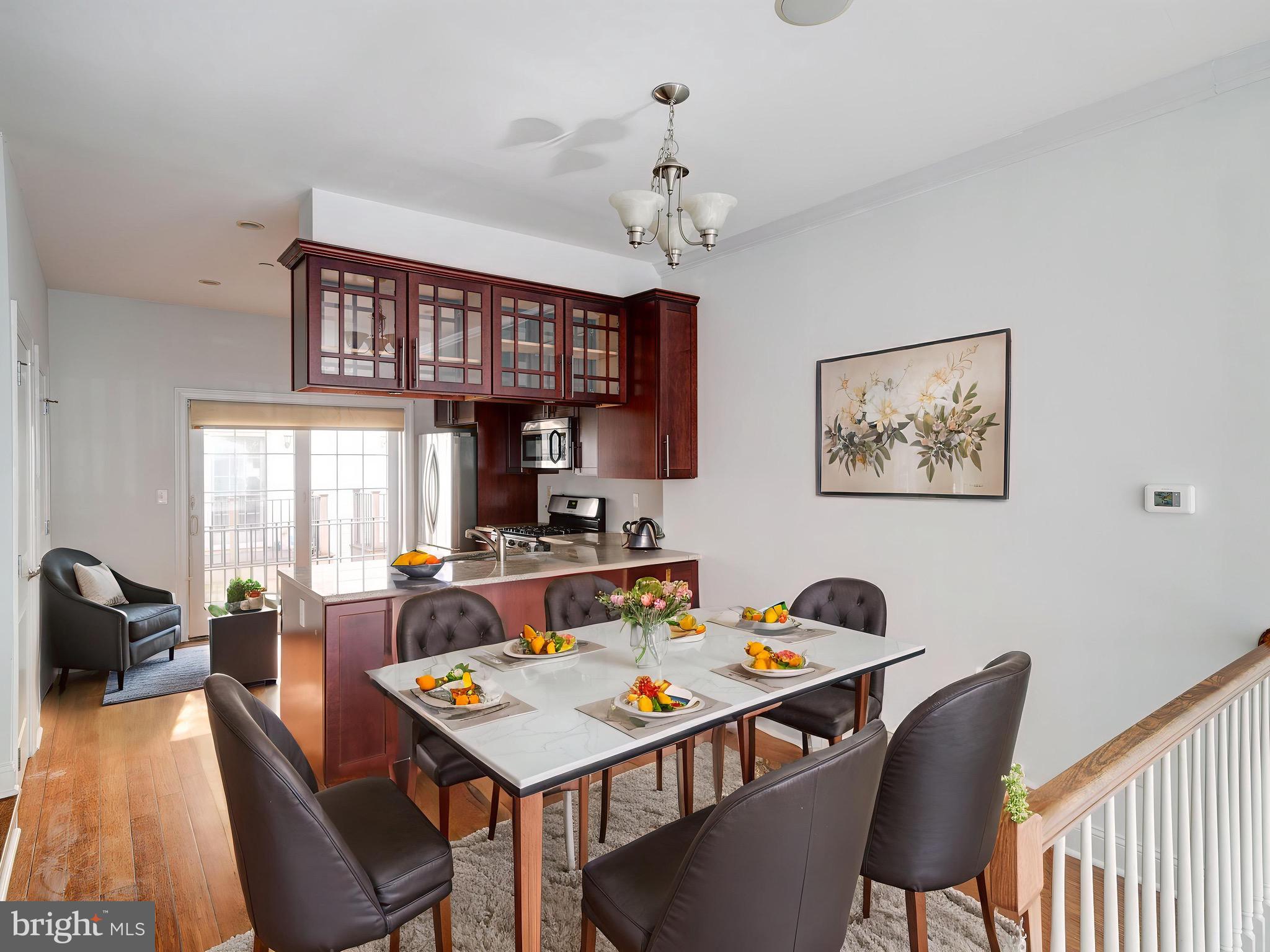 Ask us about our preferred lending program for a rate of 5 percent (5-year ARM)! Welcome to this fantastic prime opportunity, the heart of Northern Liberties within the Liberty Greene community with GARAGE PARKING. This beautifully designed PRDC Properties home is truly unique - modern and stylish. The classical brick frontage combined with garage parking is not to be missed. Enter your home into the living room with 14' high ceilings that bring in an amazing amount of natural light. Continue up a short flight of stairs that flow into the dining room and kitchen that overlooks the living room, creating a natural separation but still keeping the open concept. The balcony off the kitchen is great for grilling and outdoor entertaining. The 2nd floor will offer two very generously sized bedrooms, a full bath, and laundry. The 3rd floor offers a huge owner suite with a spa-like bathroom. Two massive walk-in closets will be ready for everything you have. The balcony off the owner's suite provides stunning city views in every direction. Other significant features include a full finished basement and not to mention the location being steps away from Liberty Lands Park, Liberties Walk, and countless cafes and restaurants. Here's your opportunity to own in the heart of Northern Liberties ! This property is vacant and easy to show. Make your appointment today.