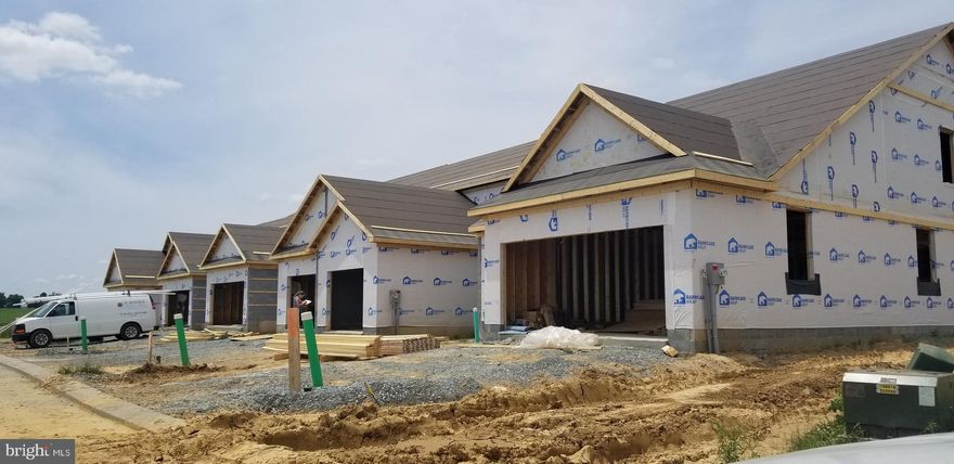 New Construction Aberdeen model. Interior town home with a 1st flr Master suite with walk-in closets, Double sinks, shower, and pantry. Kitchen with granite countertops, island, ceramic tile backsplash, and stainless steel appliances open to a  dining area and great room with luxury vinyl plank flooring. Convenient 1st floor laundry room and powder room. 2 Additional bedrooms on the 2nd level, full bathroom and loft area. No basement but additional storage over the garage. Enjoy the low maintenance living with snow removal and mowing included with the low HOA.