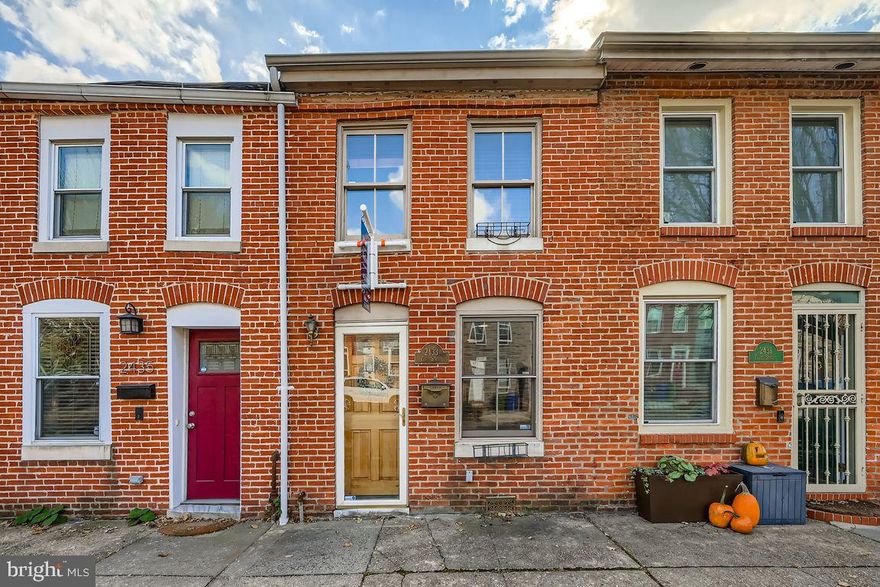 Unheard of — a true home in the heart of Canton for under $300K! This well-maintained 2-bedroom, 1.5-bath home offers an open layout with a spacious eat-in kitchen, convenient powder room, and a rare attached garage*. The rear mudroom entrance with built-in shelving adds functionality, while the second-floor private deck is perfect for relaxing with your morning coffee. The oversized primary bedroom features ensuite access and a large walk-in closet, and the second bedroom is generously sized as well. Gorgeous architectural details include a concrete-textured accent wall along the stairs. The home is being offered partially furnished with the existing furnishings, including a living room set, bedroom furniture, kitchen table and chairs, and TV — making it truly move-in ready. Washer and dryer are new! Located in one of Baltimore’s most walkable neighborhoods, you’re just steps from shops, restaurants, Patterson Park, Fells Point, and the waterfront. The homeowner has lovingly cared for this gem — just move right in!