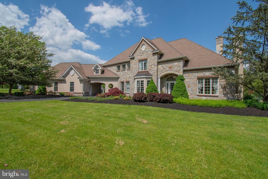 Custom Built/ French Colonial/Doyle built... 'Living Concepts' Home Design (Northgate Model). Absolutely magnificent floorplan and accents from floor to ceiling. Woodwork, flooring, lighting, Kitchen design, use of window and ceiling woodwork ... this is that special home.  (8+) acres opens the opportunity to fully engage in this beautiful serene private setting  ( Upper Makefield Twp allows horse boarding).  Bedrooms abound (5-6) which include the lower level guest/ in-law suite with full bath accommodation, rec and pool table areas, gym/work out room, office setting with a open stair walk out.  Separate Garage adjoins the main structure with a drive thru canopy style. Separate Outbuilding for that storage of a special vehicle or workshop.  
There's so much more... 4 zone Buderus Logano Heater (propane).  (2) 200amp cb panels.  Inground (1000)gal. propane .  Kitchen (sub-zero refrigerator, Viking /propane range/ Miele dlb. oven/  Farm style sink-granite countertops/ custom cabinetry/  FR (fireplace)  and Music Room (fireplace)/ Hickory HW flooring (main)/ Exquisite lighting/chandelier(s)/ alarm & sound system(s)/ custom window treatments in silk and tapestry fabrics/ Full finished TV- Bonus room (24 x 22).     So much more - this is a definite must see!