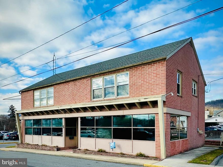 Here is an excellent opportunity to own a prime mixed-use building in downtown Thurmont adjacent to municipal parking. It is fully occupied, offering commercial and residential spaces, and zoned as a Town Business.