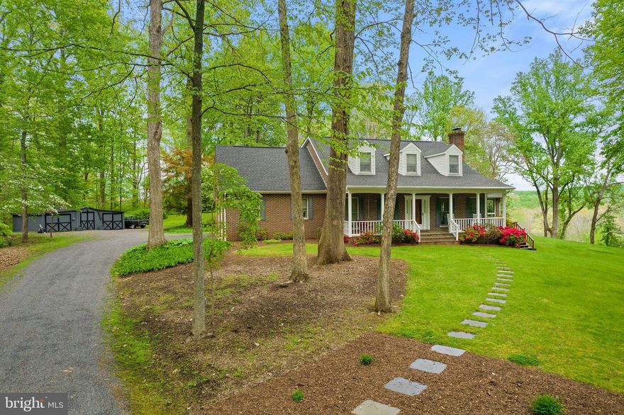 Beautiful brick Cape Cod in picturesque setting.  One owner home, immaculately maintained and thoughtfully designed. The minute you pull up you'll see that this is a special property.  The covered front porch offers plenty of seating to enjoy the views.  The main level has a master suite, spacious living room with wood burning fireplace, lovely sunroom overlooking views of neighboring farm, and gleaming hardwood floors.  The kitchen has a breakfast nook and views of nature from every window.  The laundry room off the kitchen  has plenty of storage and a utility sink.  The upper level has 2 additional bedrooms, one with a sitting room, and a huge bonus room, perfect as a fourth bedroom, office or studio.  The exterior is a lovely blend of lawn, landscaping and mature trees.  The 3-bay shed is great for gardening supplies or workshop.  This home is located on 6+ acres of sheer beauty with scenic vistas on all sides and only minutes to Marshall and Warrenton.