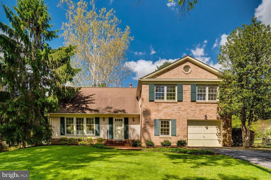 ***OPEN HOUSE SUNDAY May 3rd 1-4pm*** Welcome to this beautifully maintained split-level colonial home in the sought-after Whetstone community, where thoughtful updates, fresh paint throughout, and a warm, inviting layout to create the perfect place to call home.

Step inside to a classic center hall foyer featuring NEW LVT flooring and a convenient coat closet. The heart of the home is a well-appointed kitchen, showcasing raised panel honey maple cabinetry, granite countertops, stainless steel appliances, and a comfortable table space for everyday dining. Entertain with ease in the spacious dining room, highlighted by a new chandelier, and enjoy the seamless flow into the living room both enhanced by stylish luxury NEW LVP.

Just a few steps down, the expansive family room offers a cozy retreat with brand-new carpeting and a striking raised-hearth brick wood-burning fireplace. Sliding access leads to a large brick patio perfect for outdoor gatherings. This level also features a versatile home office or library, an additional coat closet, a half bath with ceramic tile, and interior access to the one-car garage.

Upstairs, the primary suite is a true haven with NEW carpeting, dual closets, and a dedicated dressing area with vanity. The en-suite bath includes a pedestal sink and step-in shower. Two additional bedrooms on this level also feature NEW carpeting and share a hall bath complete with a tub, ceramic tile, wood vanity, and recessed lighting.

The top level offers a spacious fourth bedroom with a large walk-in closet and additional storage ideal for guests, a home office, or flex space.

The lower level expands your living space with a generously sized recreation room featuring plush NEW carpeting, a closet, and extra storage under the stairs. A large laundry/utility room with new flooring includes a Bryant gas furnace and an A.O. Smith hot water heater, along with a dedicated workshop area for hobbies or projects.

Freshly painted throughout and thoughtfully updated, this home combines comfort, functionality, and charm complete with a one-car garage and inviting outdoor living space. A wonderful opportunity-don’t miss it! Lake Whetstone for kayaking and canoeing, walking trails, a sand volleyball court, and playgrounds, and multiple pools. All just minutes from everyday essentials like Aldi, Lidl, Starbucks, Hangry Joe’s, and more blending outdoor fun with unbeatable convenience. Major commuter routes-I-270, Route 200 (ICC), I-370 are just minutes away. Don’t miss the opportunity to own this distinctive home in the coveted Whetstone community — where privacy, space, and elegance come together.