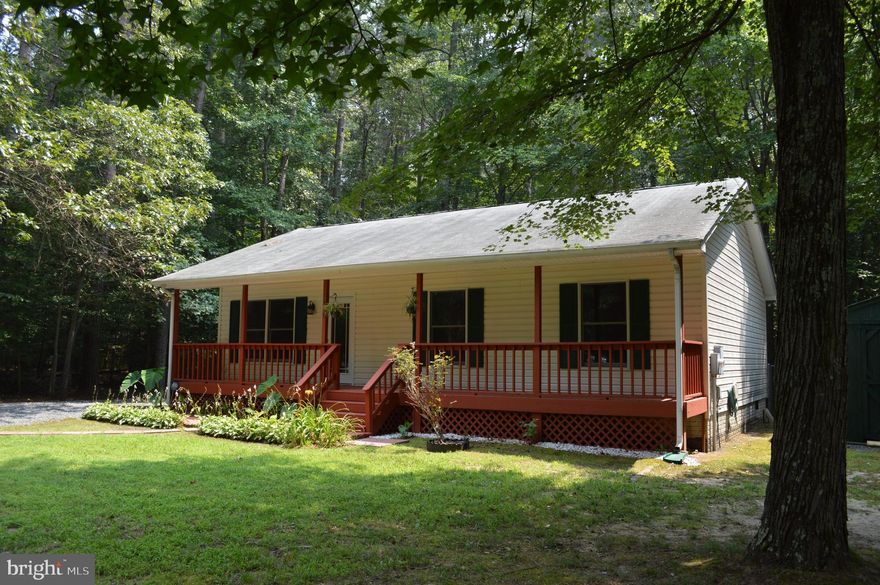 This very clean rambler is located at the end of a road and surrounded by tall trees and woods. The interior is painted in a light warm neutral color with white trim. The refrigerator, toilets and dishwasher are only a few years old. Enough space in your private driveway for six vehicles with a fenced-in backyard that backs to woods. Peaceful environment in this 3 bedroom/2 full bathroom, one level rambler in the Drum Point community. Sit on your full front porch enjoying the morning songs of birds and then use your included beach vehicle pass to Drum Point beach where you can spend your day collecting shark's teeth and shells. Finish the day on your backyard deck and hopefully catching a glimpse of the local deer. Won't last long! Credit check through Listing2Leasing. Please have at least a 650 credit score; pets case by case.