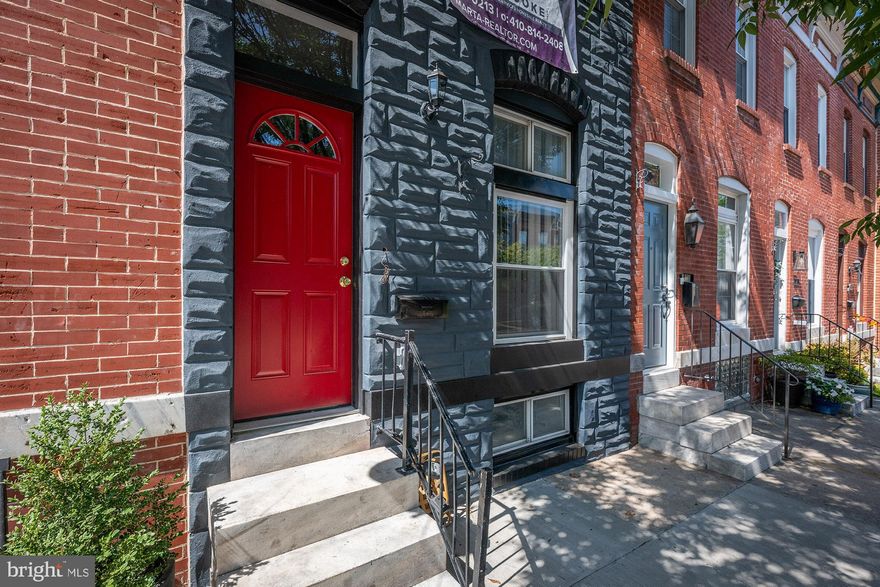 Welcome to 112 S Bouldin St, a sophisticated urban living in this elegantly updated residence, perfectly situated on one of Patterson Park's most desirable streets. This home has been meticulously renovated to blend contemporary style with timeless appeal, offering an exceptional living experience.

The main level welcomes you with a bright and inviting living room featuring pristine hardwood floors and a chic accent wall. The open-concept dining area flows seamlessly into a chef’s kitchen, showcasing brand-new cabinetry, premium quartz countertops, and high-end stainless steel appliances. The central island provides ample space for both meal preparation and casual dining. Adjacent to the kitchen, a spacious deck offers an ideal setting for outdoor entertaining. A thoughtfully placed half bath adds to the convenience of this floor.

The second level is dedicated to restful retreats with two well-appointed bedrooms and two stylish bathrooms. The master suite is a true sanctuary, featuring an elegant en-suite bathroom adorned with timeless Calcutta tile and vibrant, colorful accents. The secondary bedroom includes access to a private deck, perfect for enjoying serene moments. Both bathrooms are designed with high-quality finishes and meticulous attention to detail.

The lower level is designed for versatile use, featuring durable luxury vinyl plank (LVP) flooring and an expansive layout suitable for a clubroom or family room. This space is ideal for hosting gatherings, relaxing, or customizing to fit your needs.

Additional Features: This home is equipped with modern mechanical systems, including a new HVAC system, updated plumbing, and new electrical wiring, ensuring both efficiency and peace of mind. Off-street parking adds an extra layer of convenience in this vibrant neighborhood. The property’s prime location offers easy access to the bustling Canton area, the scenic Patterson Park, both Johns Hopkins campuses, and major highways for effortless commuting.

This impeccably renovated home is a rare find in Patterson Park, offering both style and functionality. Don’t miss the opportunity to make it yours
