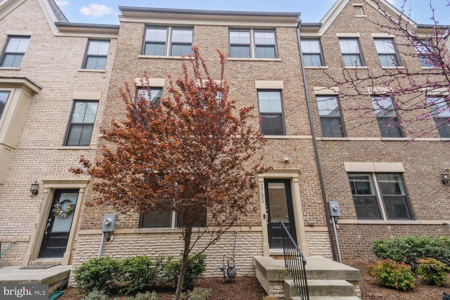 Welcome to 3751 Signal Knob Lane, nestled in the highly sought-after Ambrose Hills neighborhood of Falls Church. The expansive main living area boasts lofty ceilings and large windows providing plenty of natural light throughout the living room, dining area, and kitchen.  The gourmet kitchen features stainless steel appliances, custom cabinetry, quartz countertops, and a spacious central island with seating for 6.  In addition, enjoy outdoor cooking and entertainment on the deck right off the kitchen are.  The upper level includes a luxurious primary suite which features a generous walk-in closet, 2nd closet, and an en-suite bathroom.  There are three additional spacious bedrooms with plenty of closet space. A shared bathroom with a bathtub conveniently serves the secondary bedrooms on this level, while a washer/dryer and linen closet add practicality.  This nearly 2200 sq ft townhouse also boasts a private rooftop terrace just off the loft space, providing an ideal outdoor entertaining space. The loft adds versatility, whether used as a home office or a gathering spot for guests.  Ideally situated in Falls Church and just moments away from popular shopping destinations, upscale dining options, and entertainment venues. With easy access to major commuter routes such as Route 7, Highways 66 & 495, it's an excellent choice for professionals working in nearby cities.