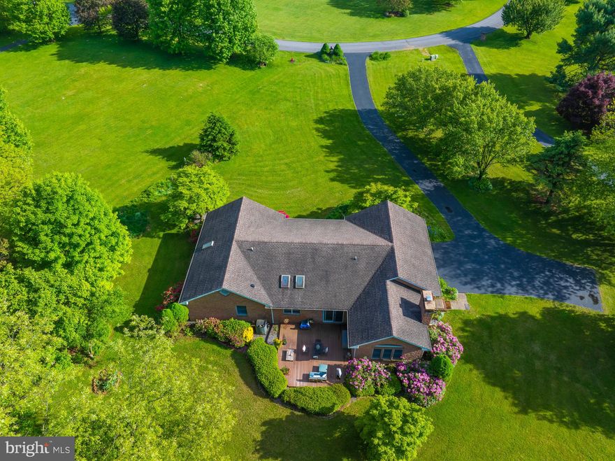 Exceptional custom-built brick ranch home situated on 3.4 private acres in the desirable Crystal Brook Subdivision. This impeccably maintained property offers low-maintenance living in a peaceful, natural setting surrounded by mature trees and beautiful landscaping—designed by a master gardener.

This bright and airy home features 3 bedrooms, 2.5 bathrooms, and an inviting family room with a fireplace. The kitchen is equipped with quartz countertops, stainless steel appliances, and extensive cabinetry. Large windows throughout the home showcase scenic wooded views and abundant wildlife.

Enjoy outdoor living with a spacious deck overlooking the secluded backyard.  Perfect for working from home.

Tucked away on a quiet street, yet conveniently located near I-81, Martinsburg, and the MARC commuter train to Washington, DC. Move-in ready and a rare find!

Highlights:

3 Bedrooms / 2.5 Baths

Open and comfortable floor plan

Quartz kitchen counters & stainless appliances

Fireplace in family room

Deck with wooded views

3.4-acre lot with private setting

Easy access to I-81 and MARC train