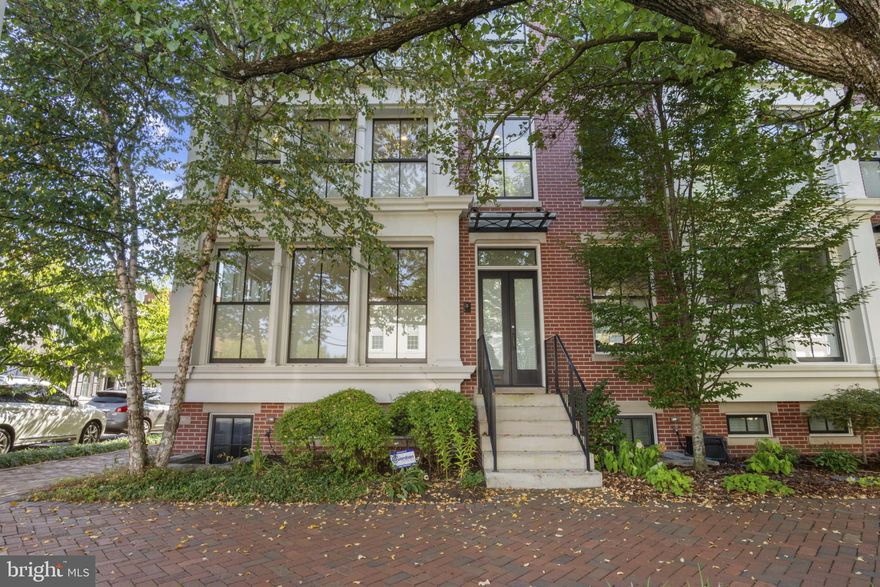 LEED Gold Certified   Townhouse Inspired by 1850s Cast Iron Architecture
Experience over 3,300 sq ft of light-filled luxury in this architecturally unique and energy-efficient home, just blocks from the heart of Old Town, the waterfront, and Metro. Designed with sustainability and elegance in mind, this home meets LEED Gold standards, offering both beauty and low utility costs.
Highlights Include:
Gourmet Chef's Kitchen
Custom cabinetry, honed black granite countertops, Thermador appliances & range hood, glass tile backsplash, and a spacious island with breakfast bar.
Elegant Interiors
Open floor plan with hardwood floors throughout, floor-to-ceiling custom windows, and soaring ceilings. Recessed dimmable LED lighting and custom railings add refined ambiance.
Master Suite Retreat
Includes a private study or nursery, walk-in closet with ELFA system, and a spa-inspired master bath with marble tile.
Finished Lower Level
Features a large egress window, porcelain floors, laundry room, and generous storage space.
Technology & Comfort
Built-in speaker and intercom system with touchscreens (kitchen & master bedroom), plus geothermal heating and cooling for year-round efficiency.
Outdoor Living & Parking
Airy private terrace above a two-car garage and limestone entry stairs for an elegant welcome.
Unbeatable Location:
Easy access to GW Parkway, Reagan National Airport, and downtown DC.
Energy-Efficient Living:
Constructed to LEED Gold standards, ensuring healthier indoor air quality, premium insulation, and impressively low utility bills.